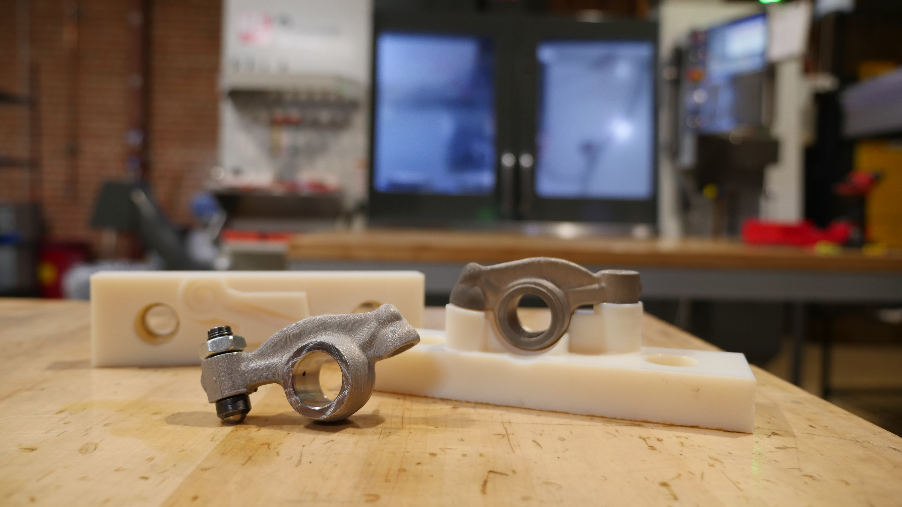 Post Print of Rocker Arm in front of Printer