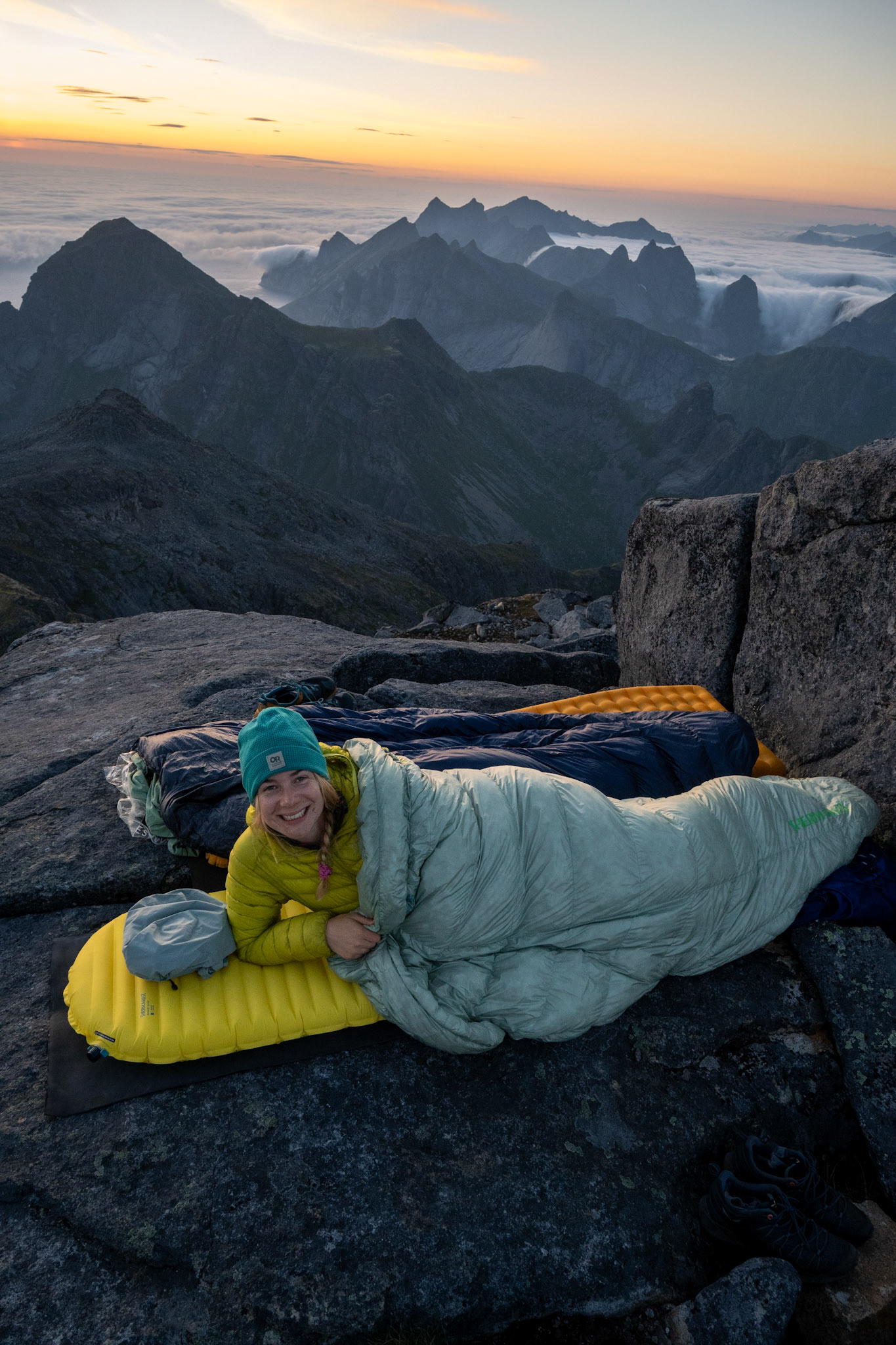 We cowboy camped at the top of Hermanmsdalstinden with two Swiss Germans. The sun set briefly from around 11:45pm to 2:30am, but while the sun went below the horizon the light stayed - leaving the mountains in a surreal twilight.