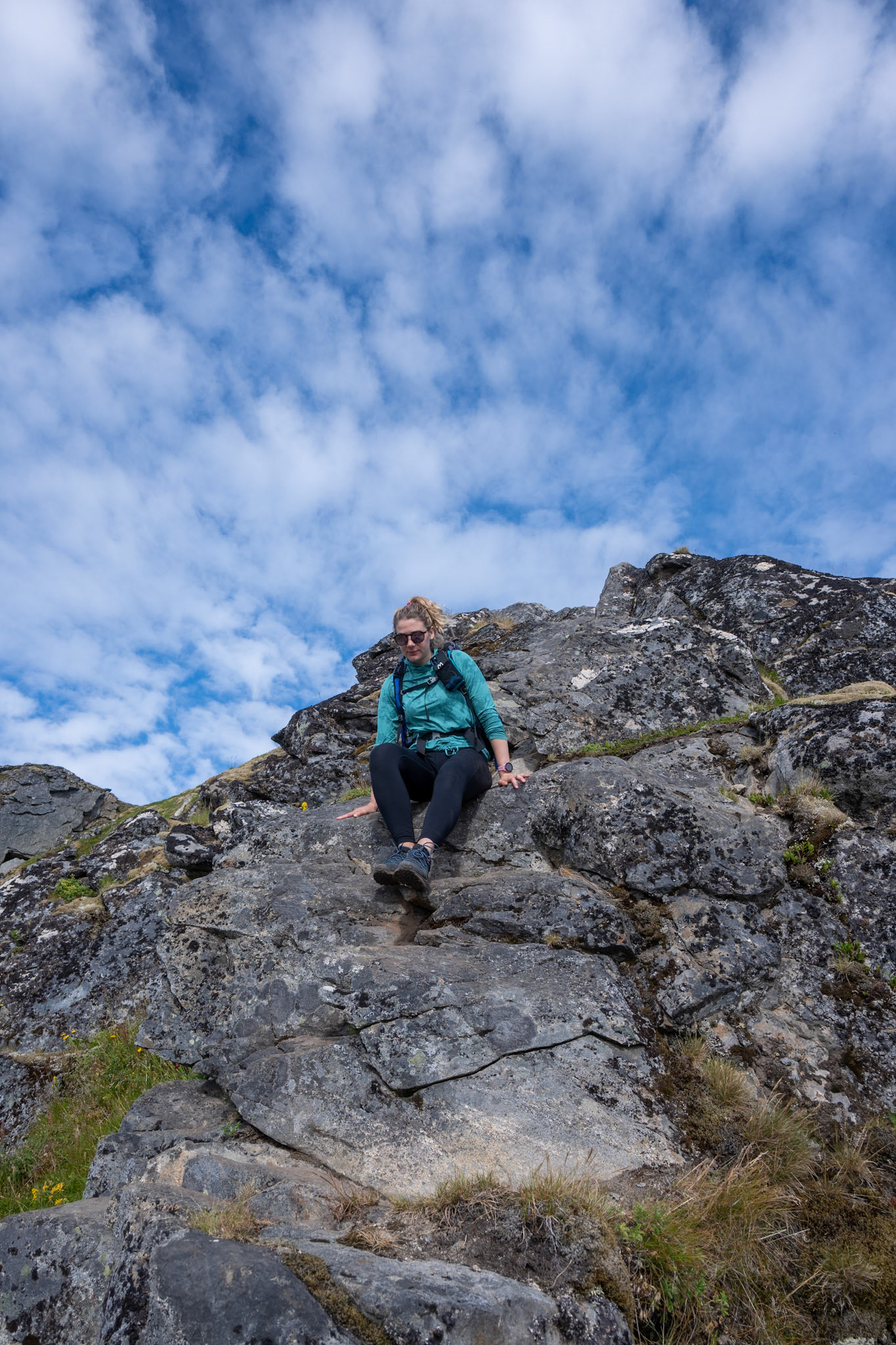 Day 12 - after sleeping on top of Hermannsdalstinden, we packed up our sleeping pads and bags and enjoyed the view as we descended. The sun was up fully now, but gratefully we had a cool ocean breeze and some clouds.