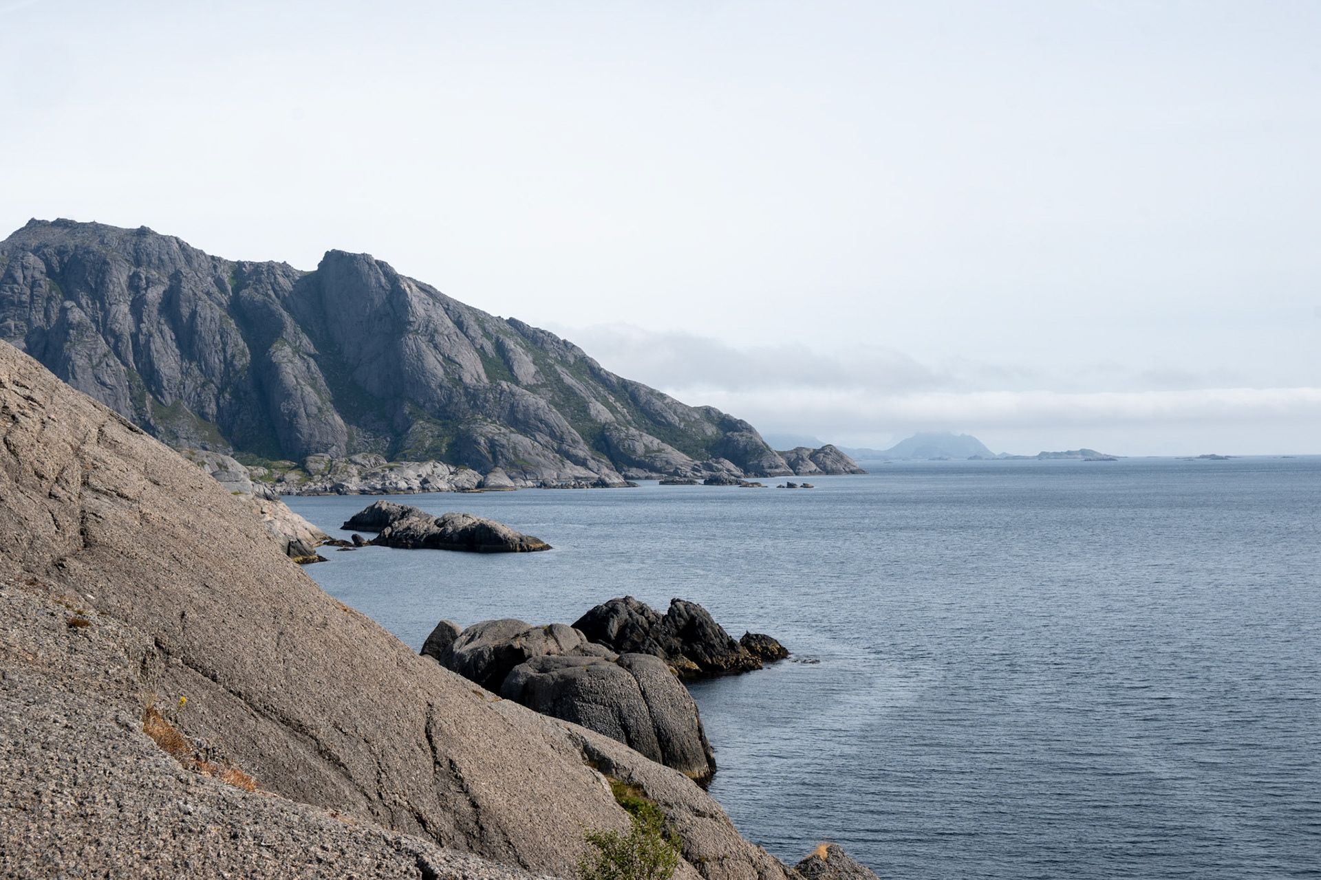 Day 7 - the coastal path from Nusfjord was rewarding - rocky vistas and fresh sea air. However, the second half of this stage required a road walk into the town of Ramberg. Along the way, Helena and I bumped into a woman who lost her car’s spare tire in the water. We fished it out for the lady, and she introduced herself as Inja. Originally from Sweden, she came over to Lofoten over 20 years ago and works as a nurse in the hospital. After learning about the history of the area, she drove us into Ramberg were we grabbed a quick meal and coffee before hiking towards Kvalvika beach.
