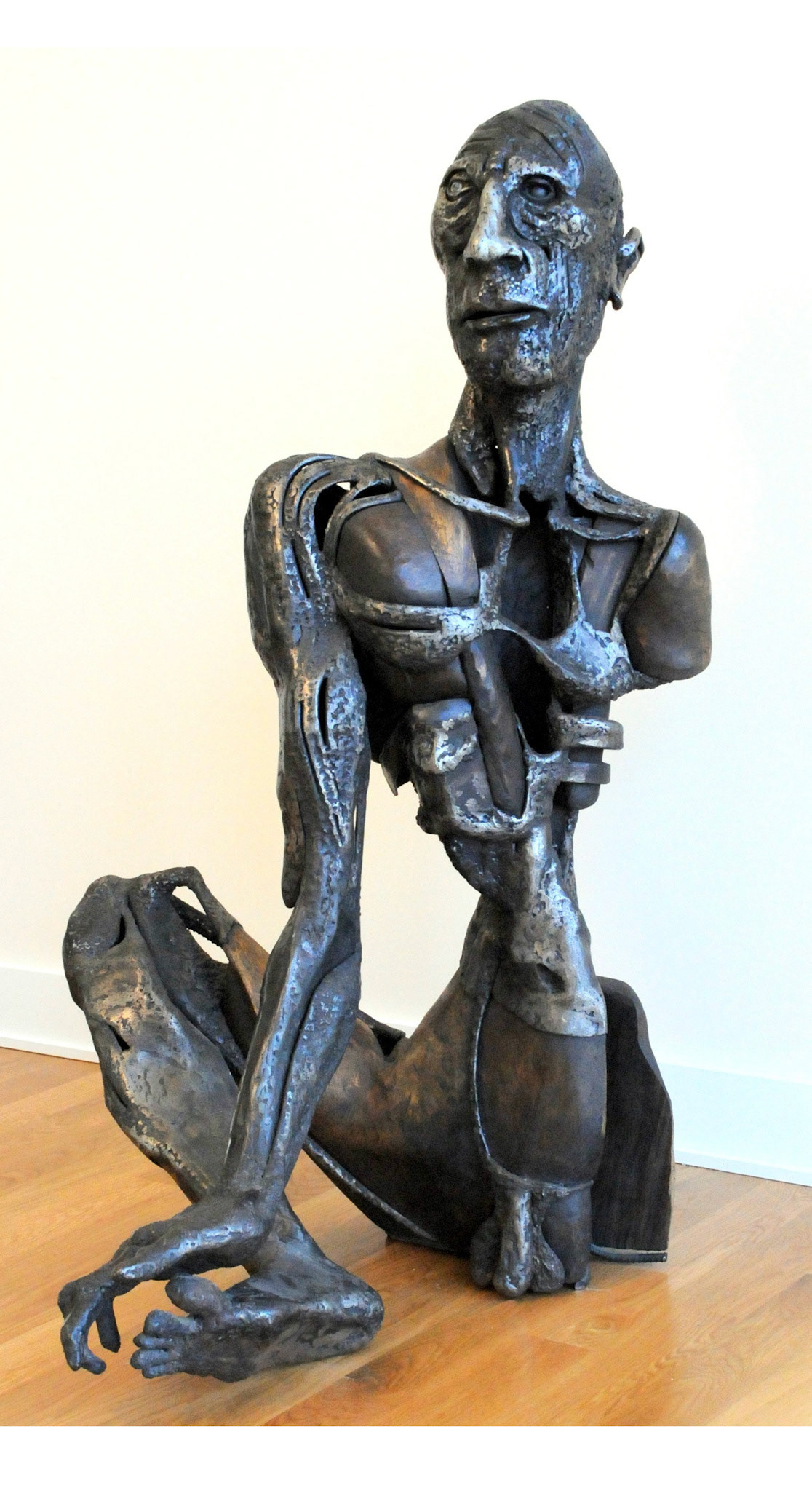 P.O.W. Survivor.( welded steel+ wood)