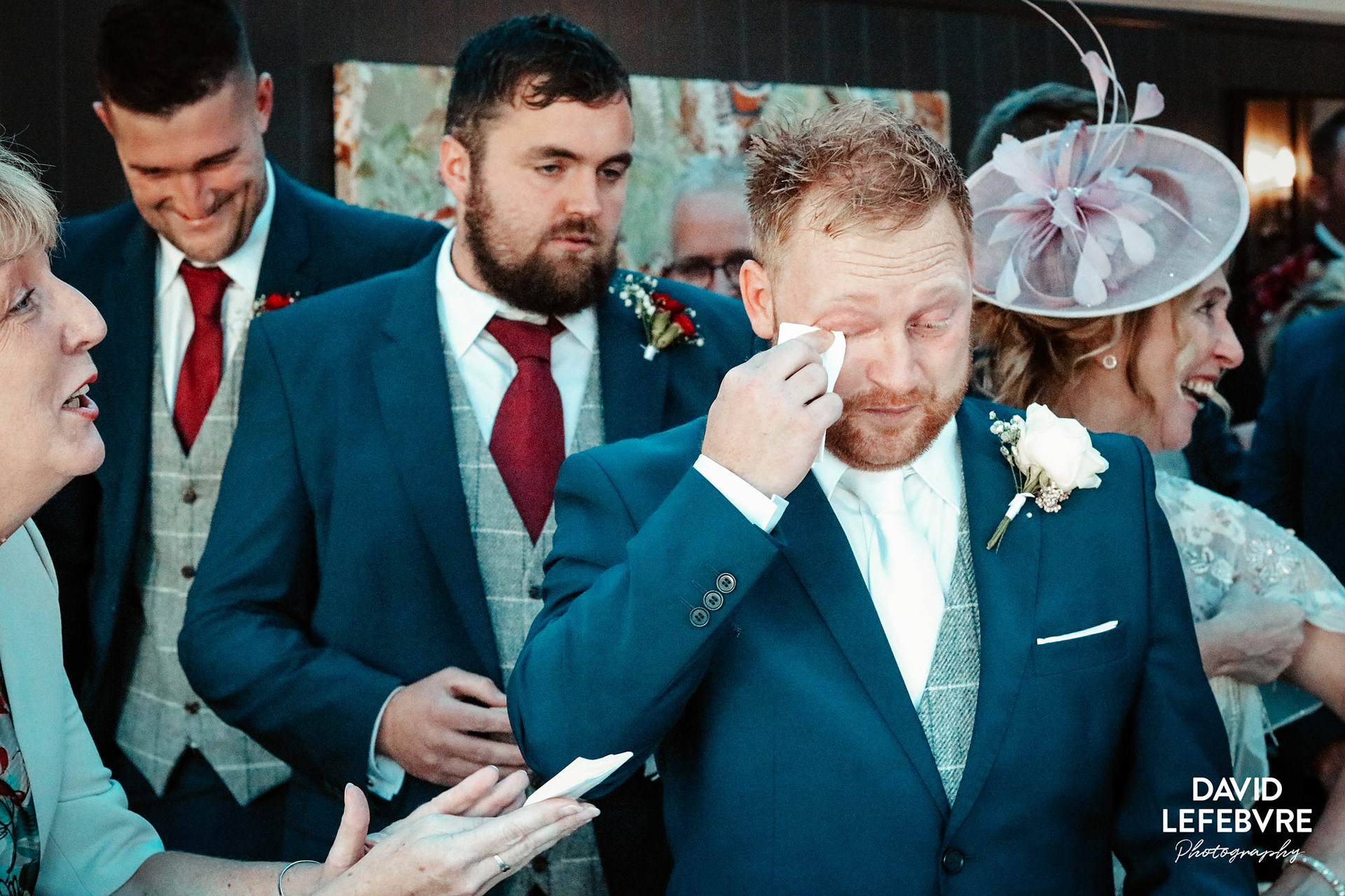 crying emotional groom at bay tree wedding