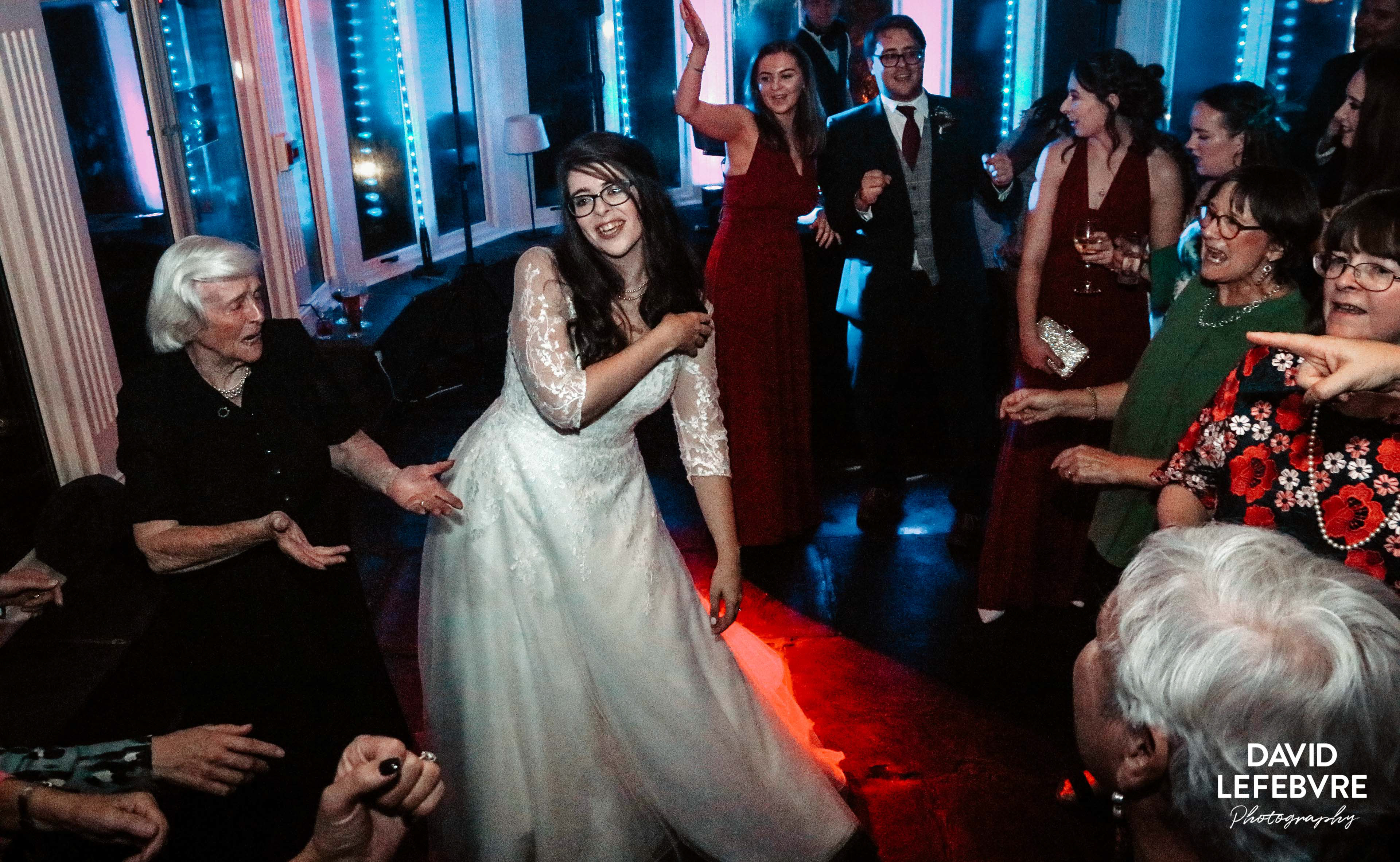 bride surrounded by guests at bay tree wedding