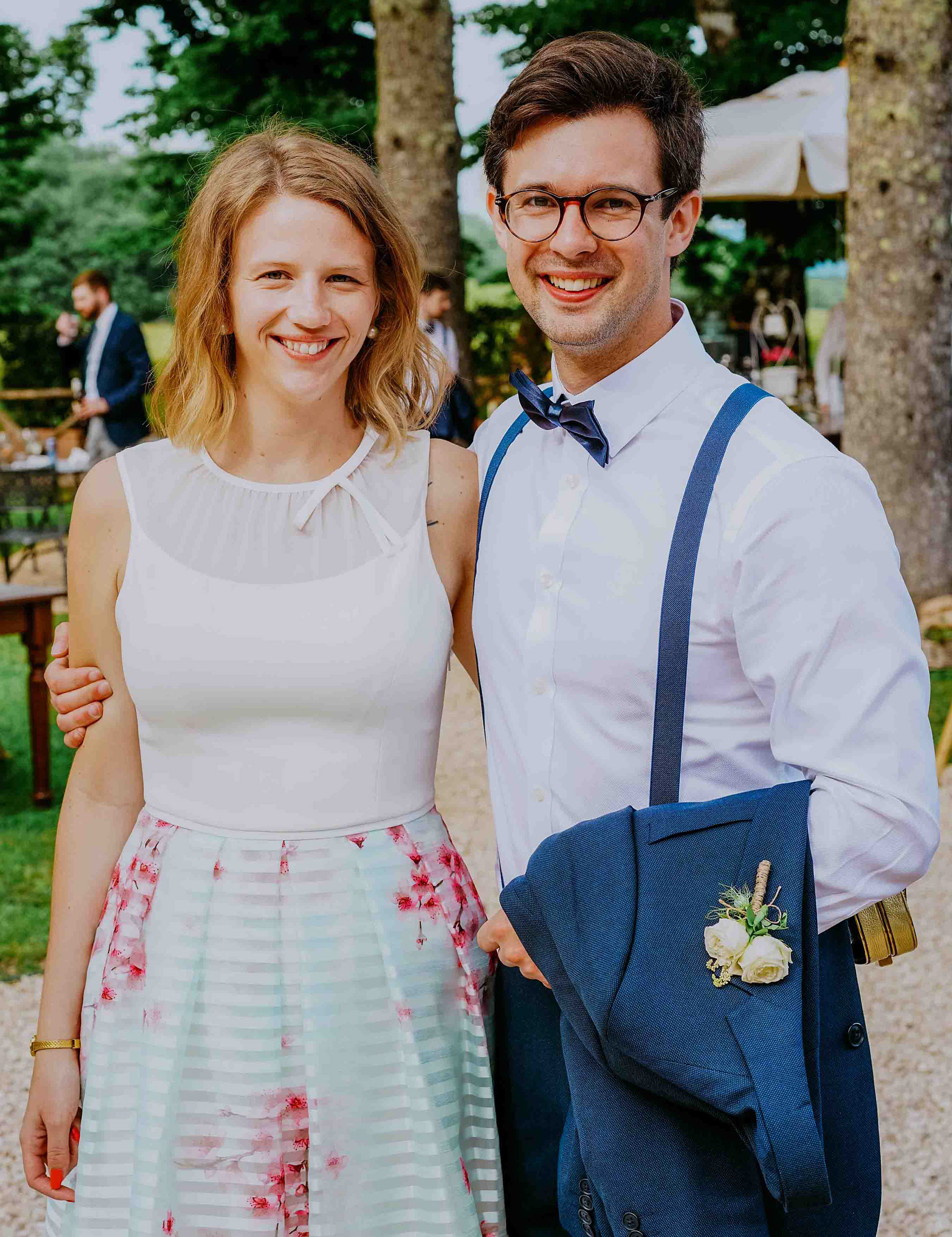 guests smiling at wedding in san galgano abbey