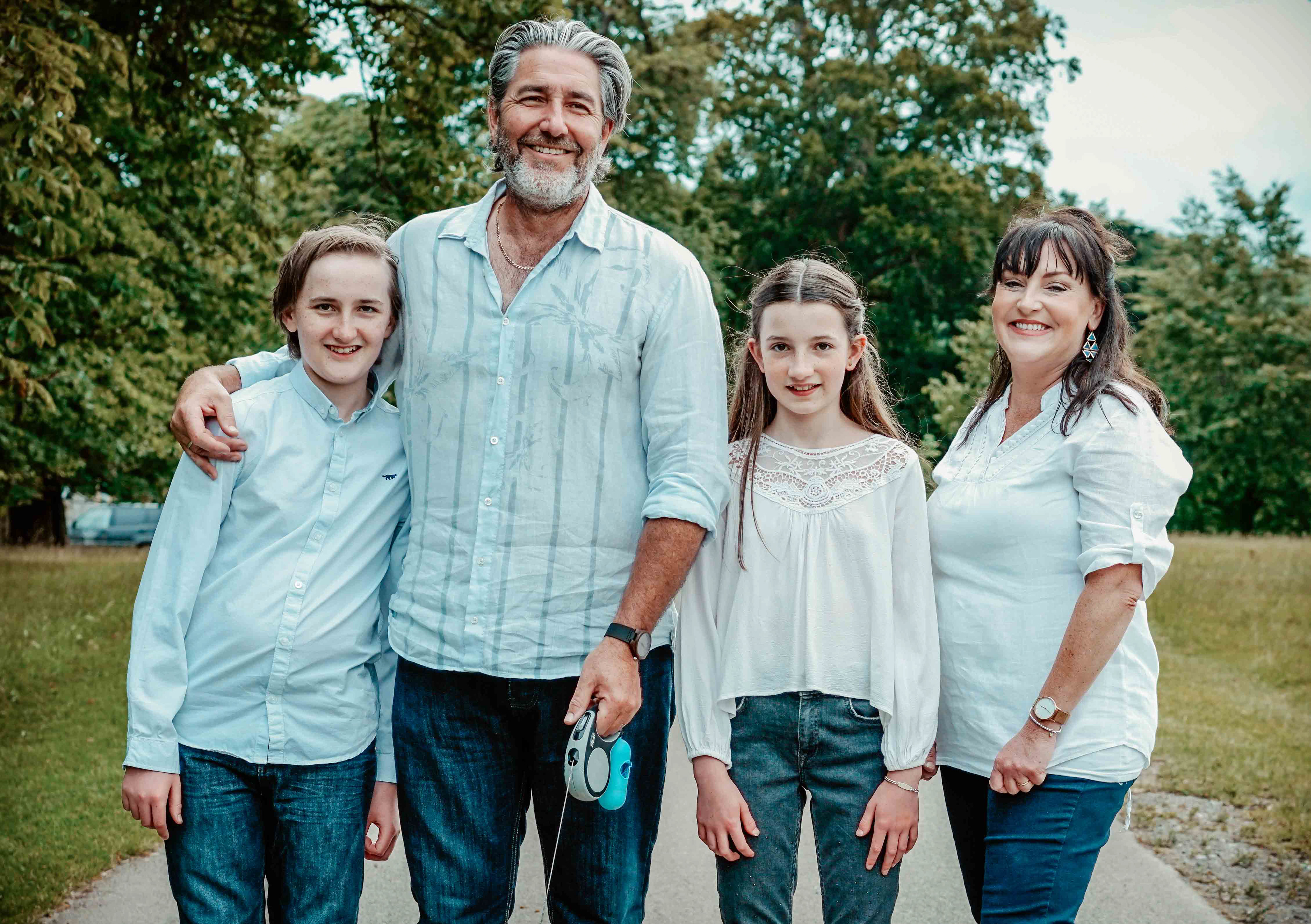 close shot of family walking dog near blenheim palace in oxfordshire uk with photographer david lefebvre