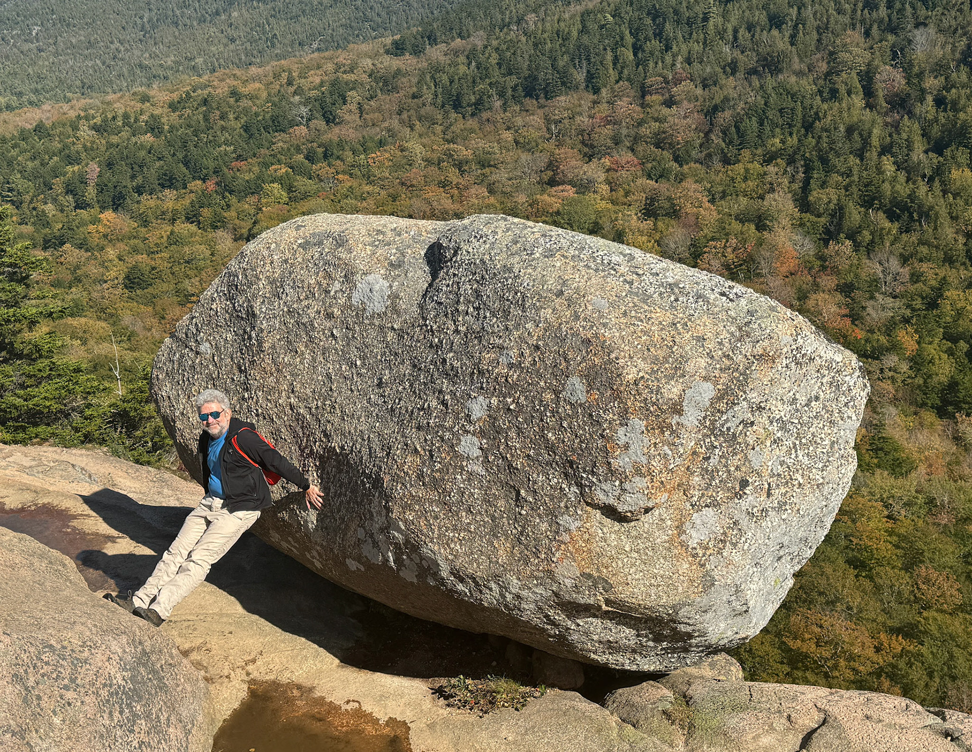 Steve pushing Bubble Rock off the hill