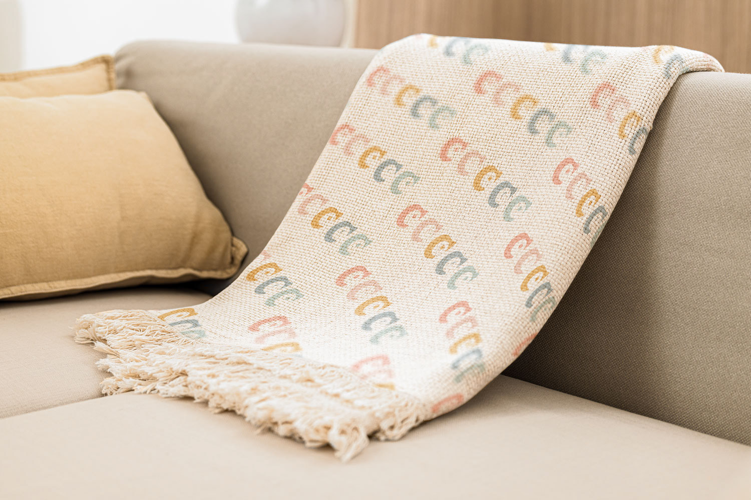Baby Mine blanket showcasing the brand element pattern