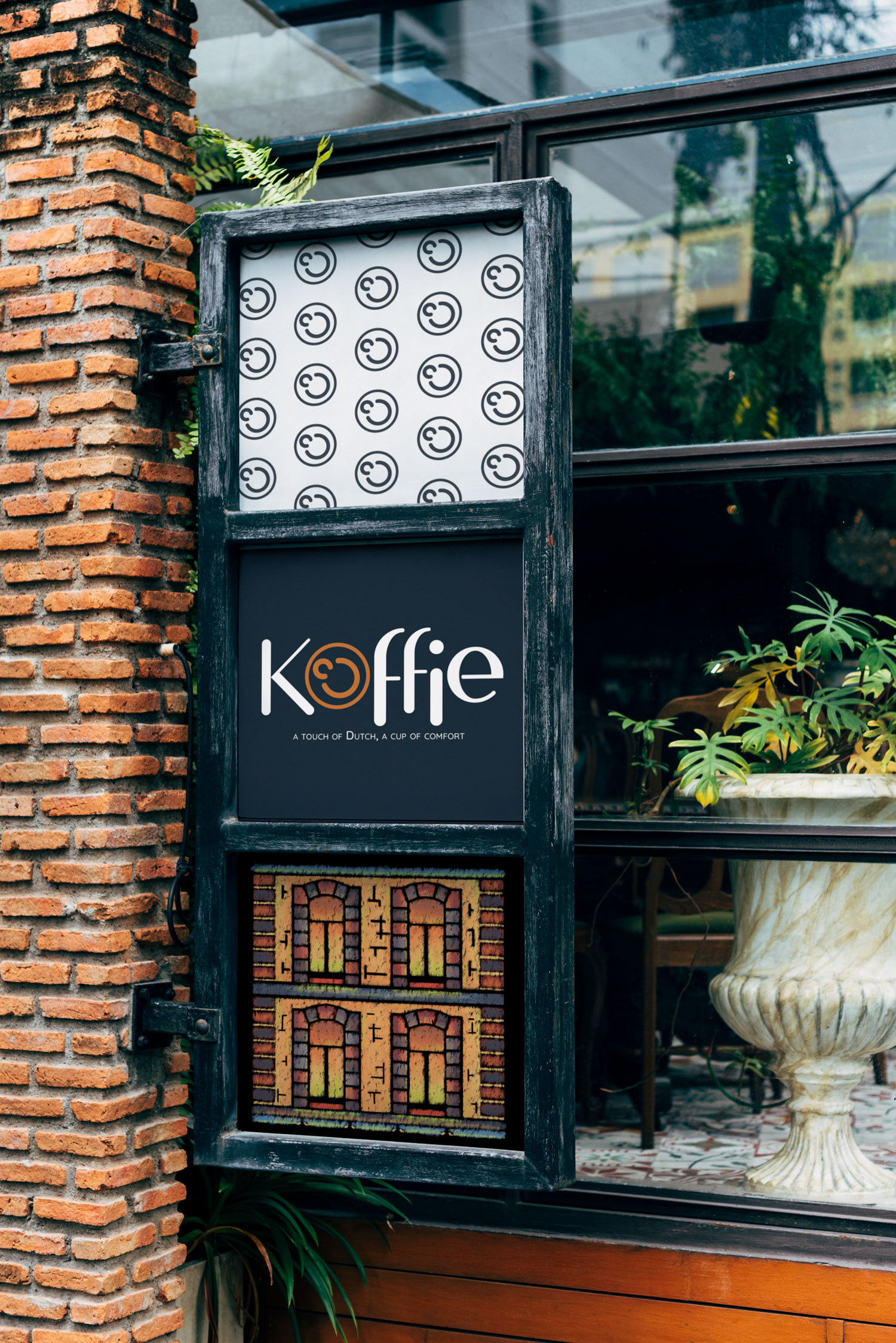 Koffie logo sign, pattern sign, and coffee bag sign displayed in front of coffee shop window