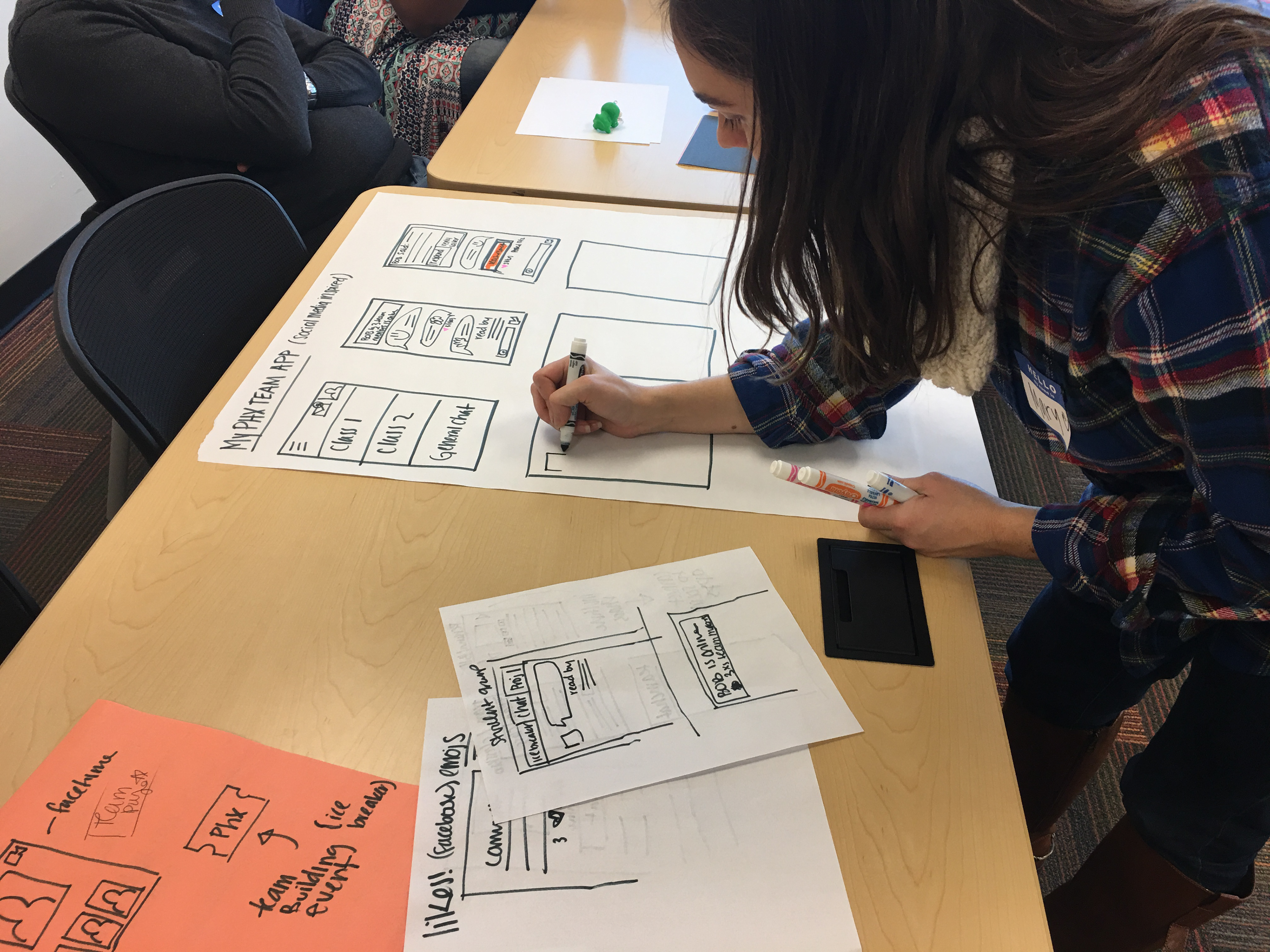 Mary working on wireframes in the University of Phoenix workshop