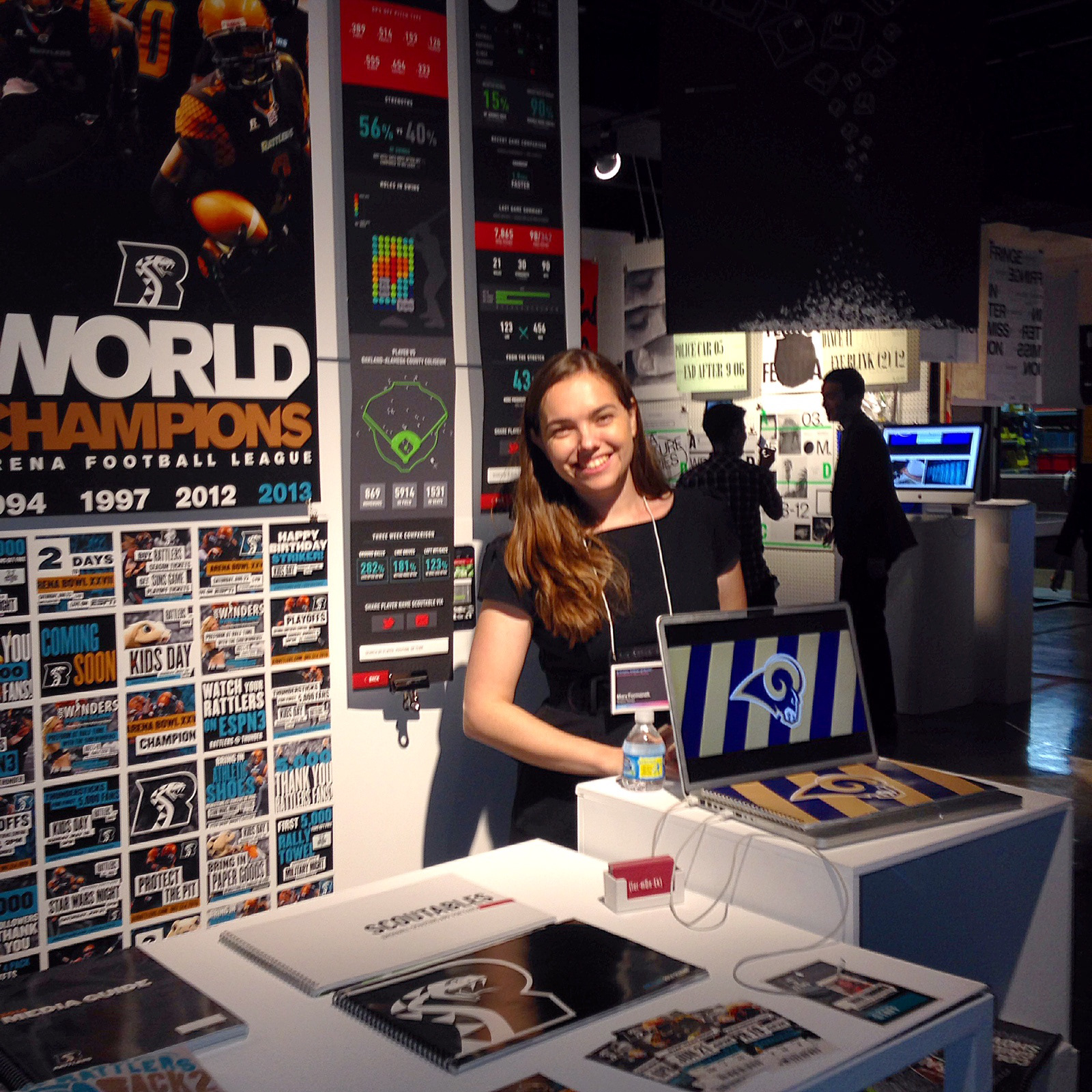 Mary at her college grad show. Mary freelanced her way through college, often working with sports professionals on sports apps, interactive stadium experiences, and branding.