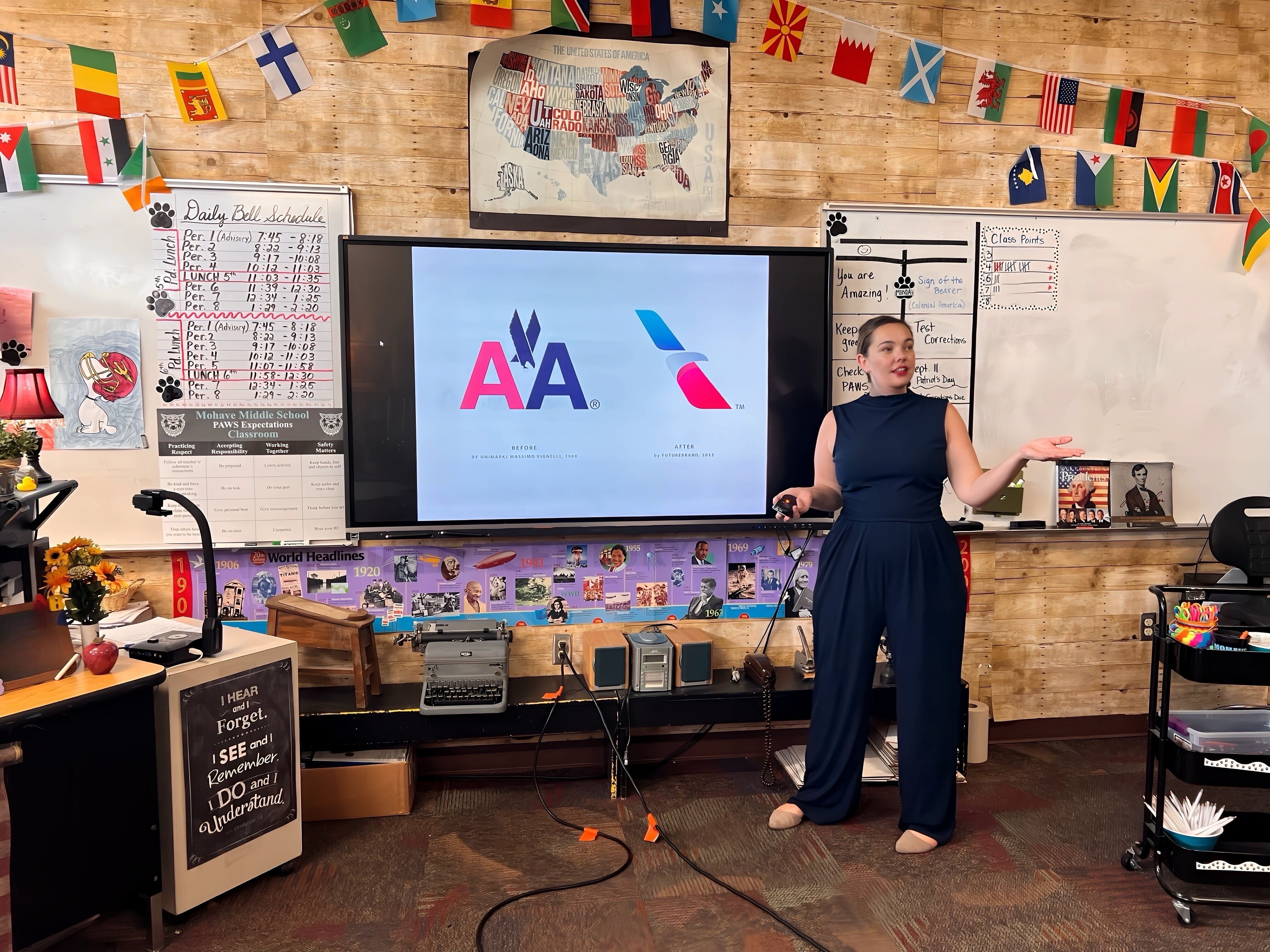 Mary talking about the history of design and change at a middle school.