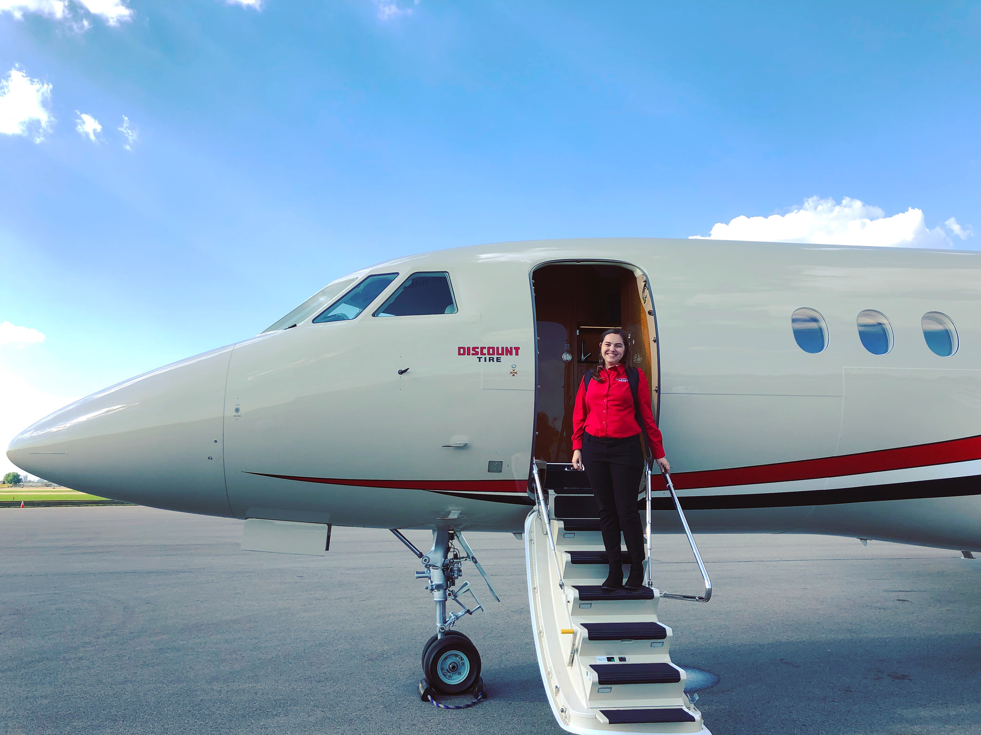 Mary traveling around the country for Discount Tire to collect user insights from in-store teams.