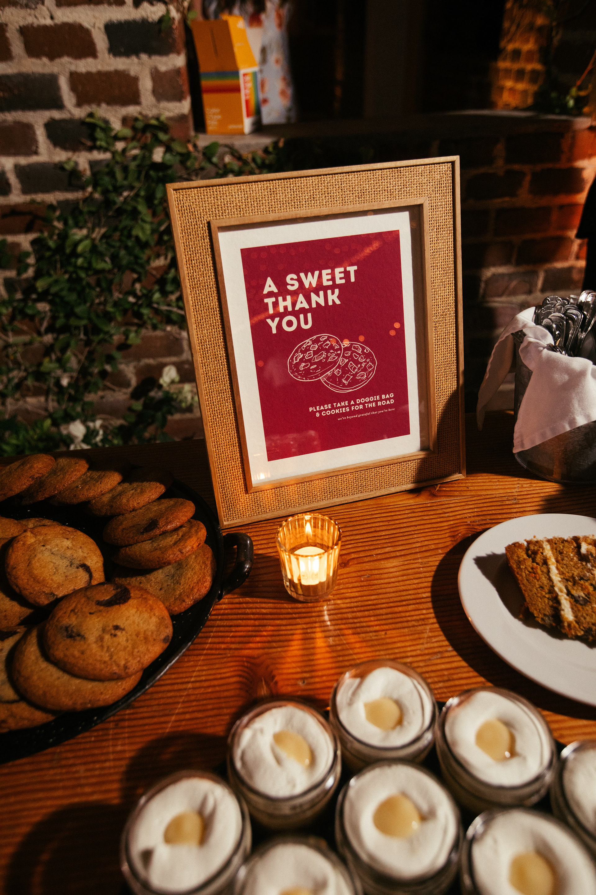Signage for our dessert table, including a CTA to take home some cookies!