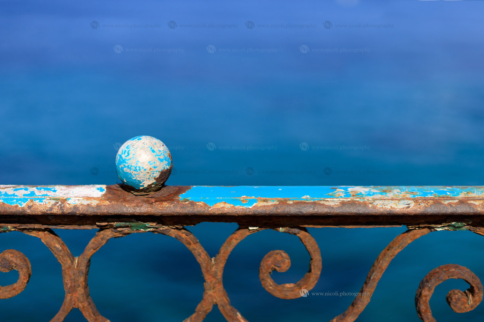 Rusty and worm rust fence. Shallow depth of field.
