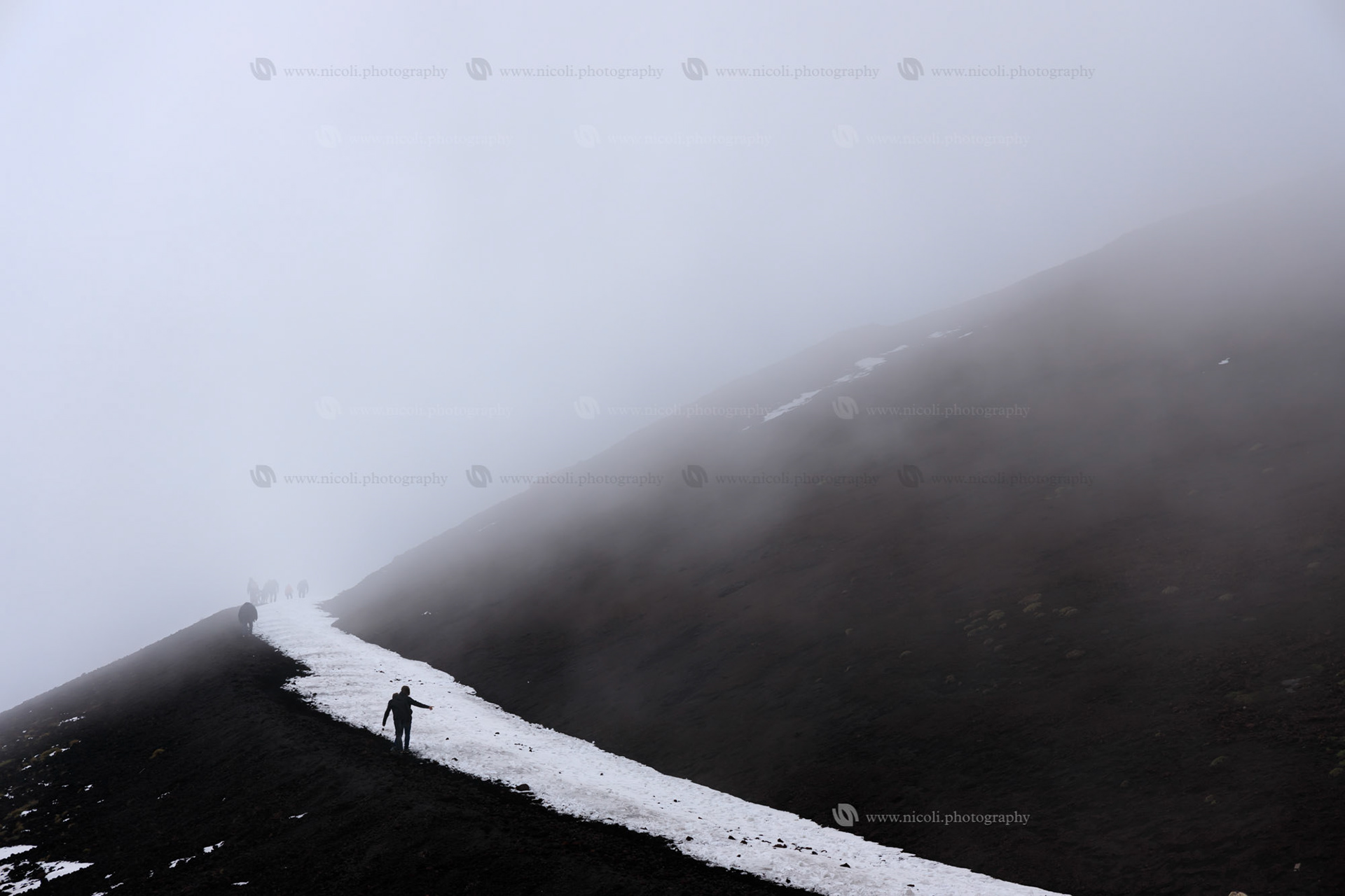 Mount Etna in a foggy and cold day.