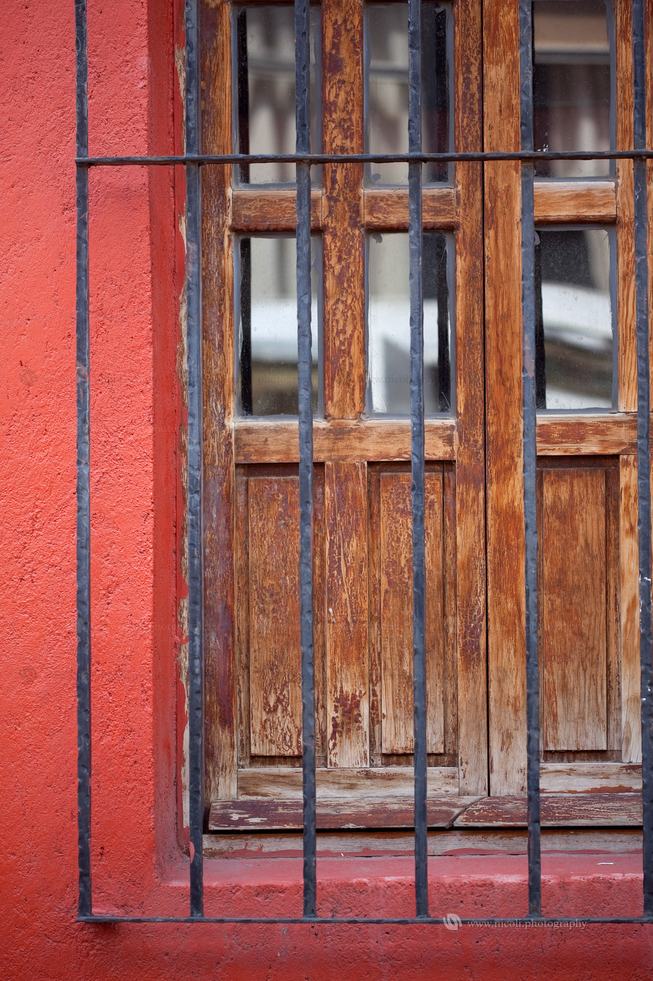 Old window and fence. Shallow depth of field.