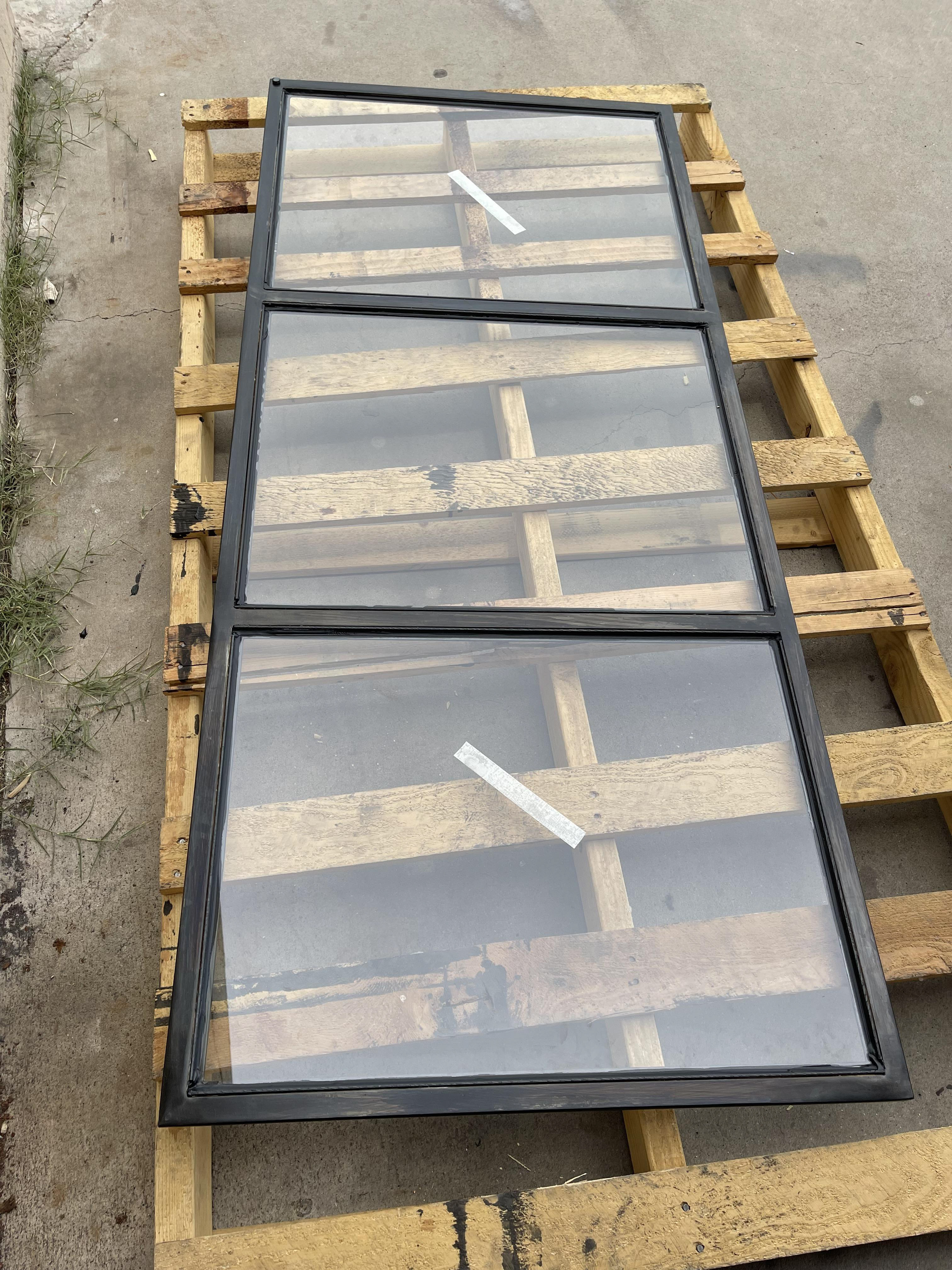 Glass door with steel tubing frame