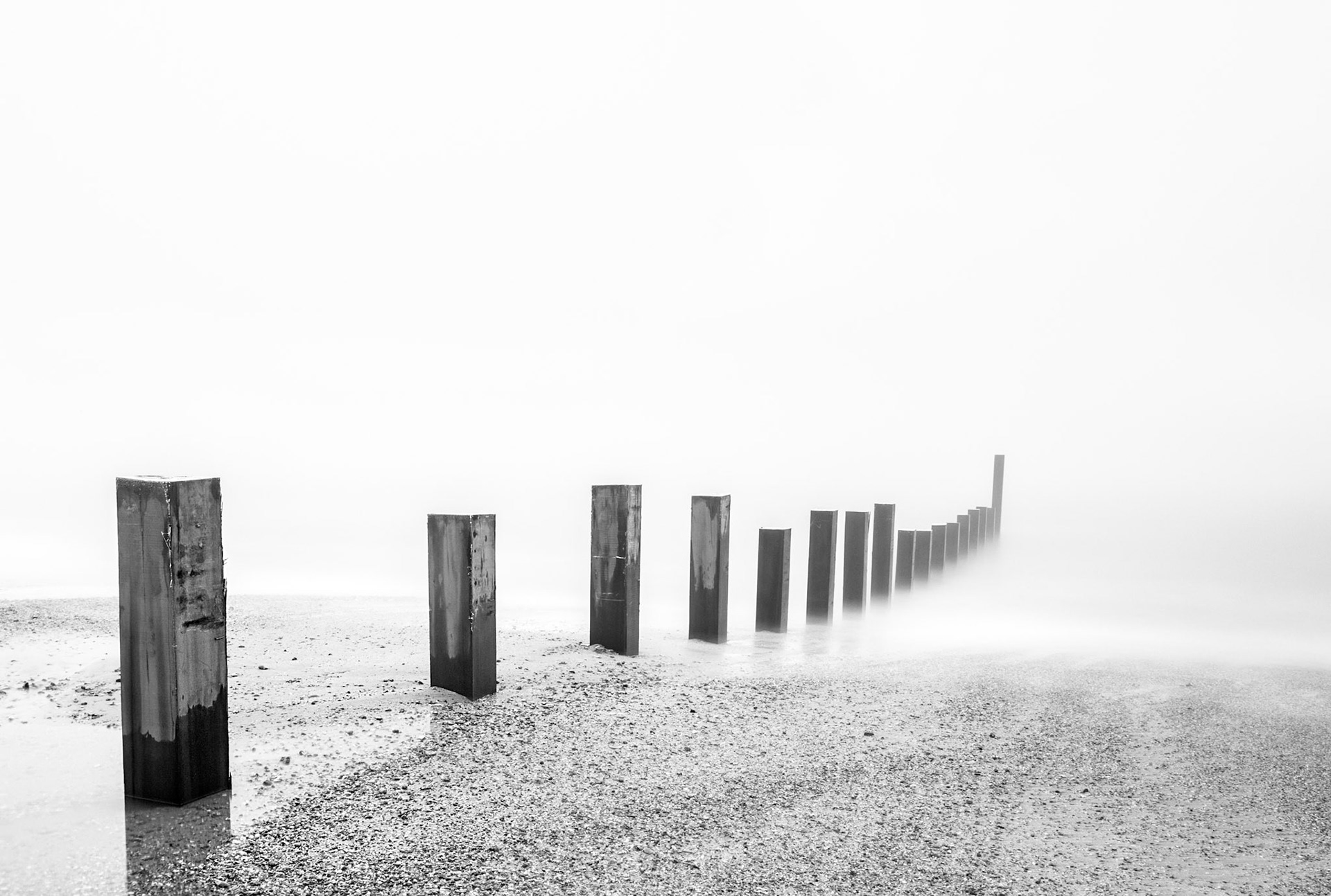 New groynes are being built at Southbourne beach in Bournemouth to help combat the power of the rides dragging away the sands - they make a perfect focus point, especially on a foggy day!