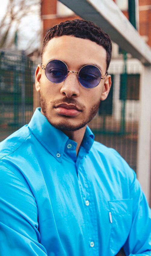 Male model for a fashion shoot with east london vintage designer shop