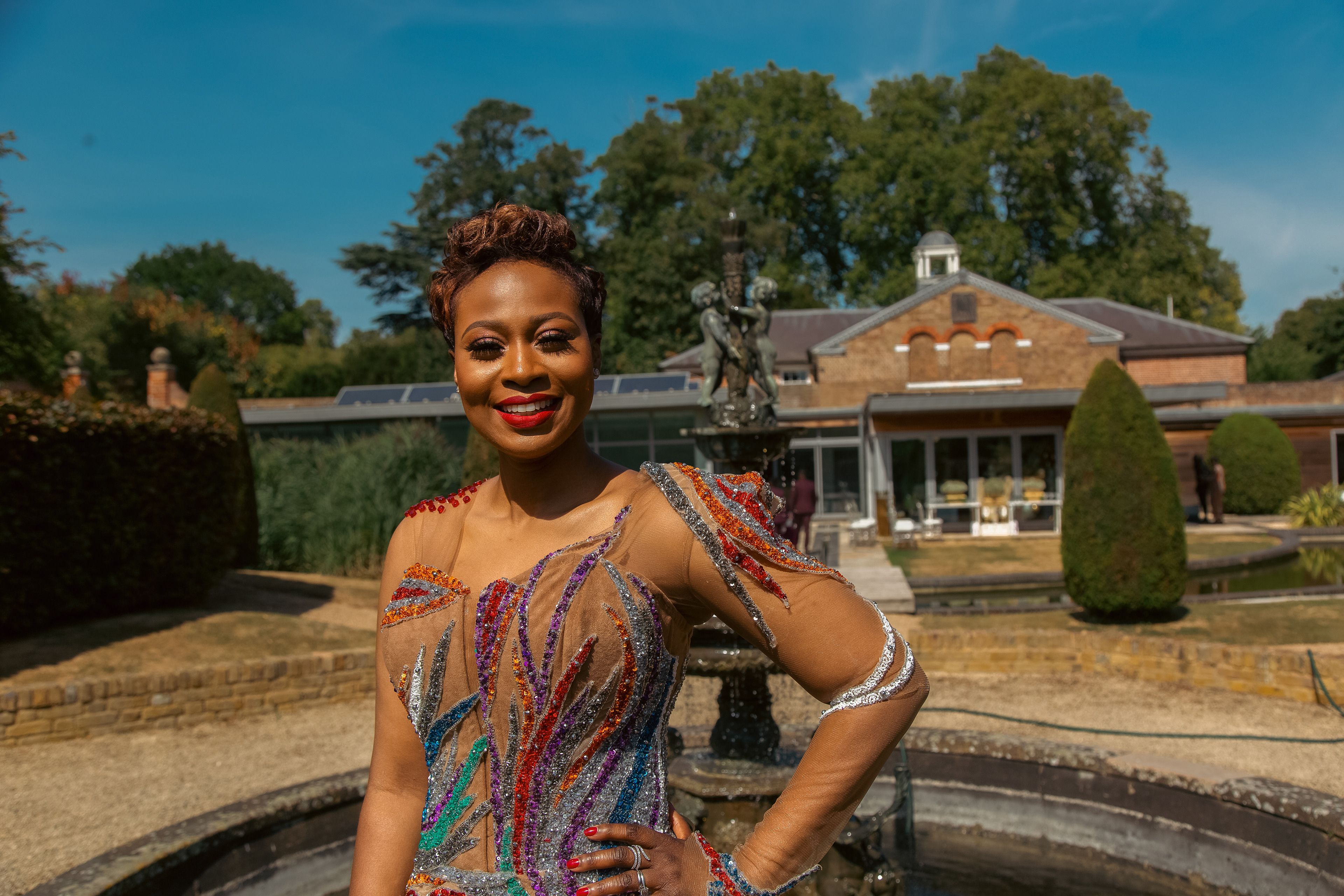 The birthday girl poses outside the property 