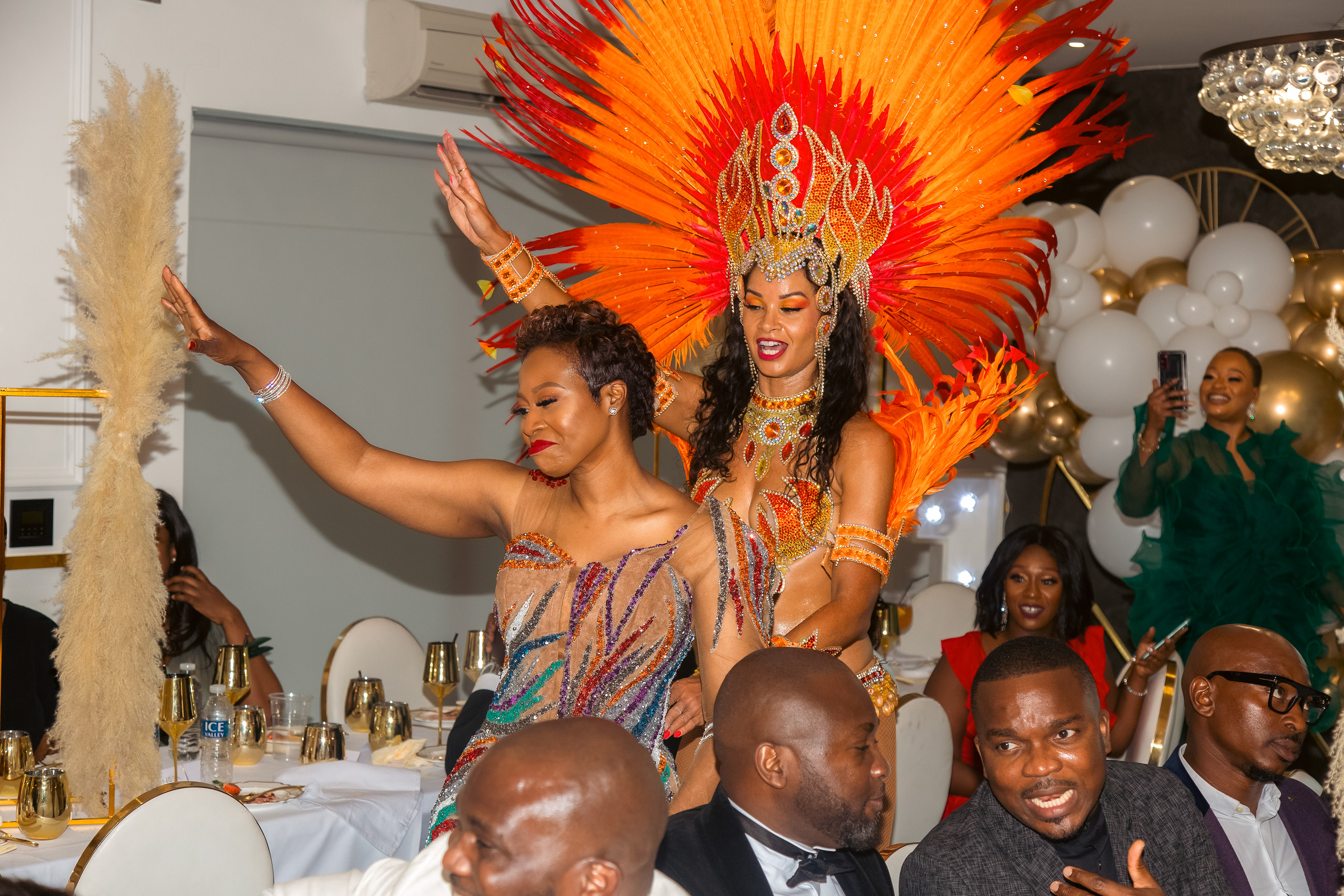 The birthday celebrant dancing with some brazilian carnival dancers 