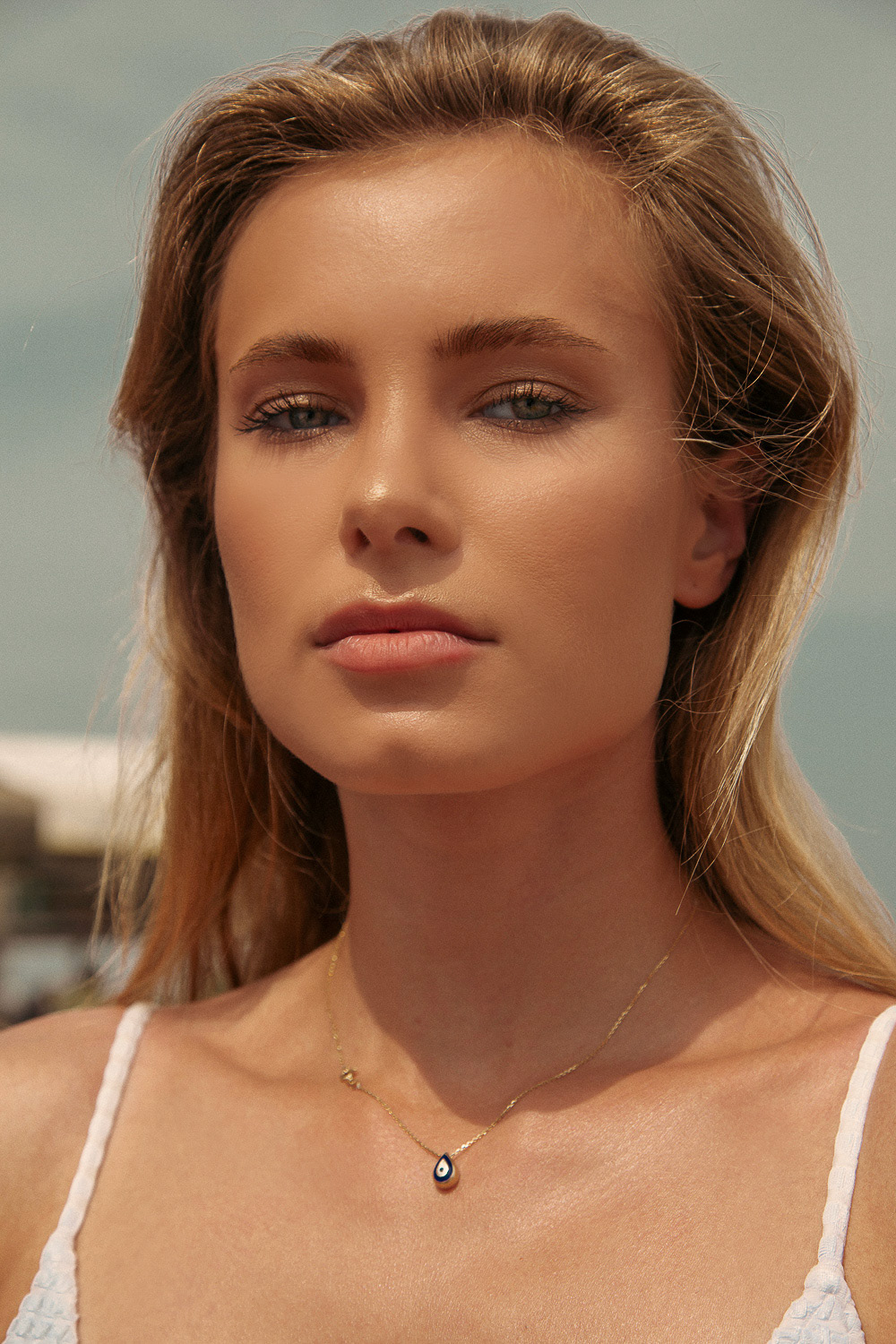 Model portrait in the sun at a beach in Barcelona