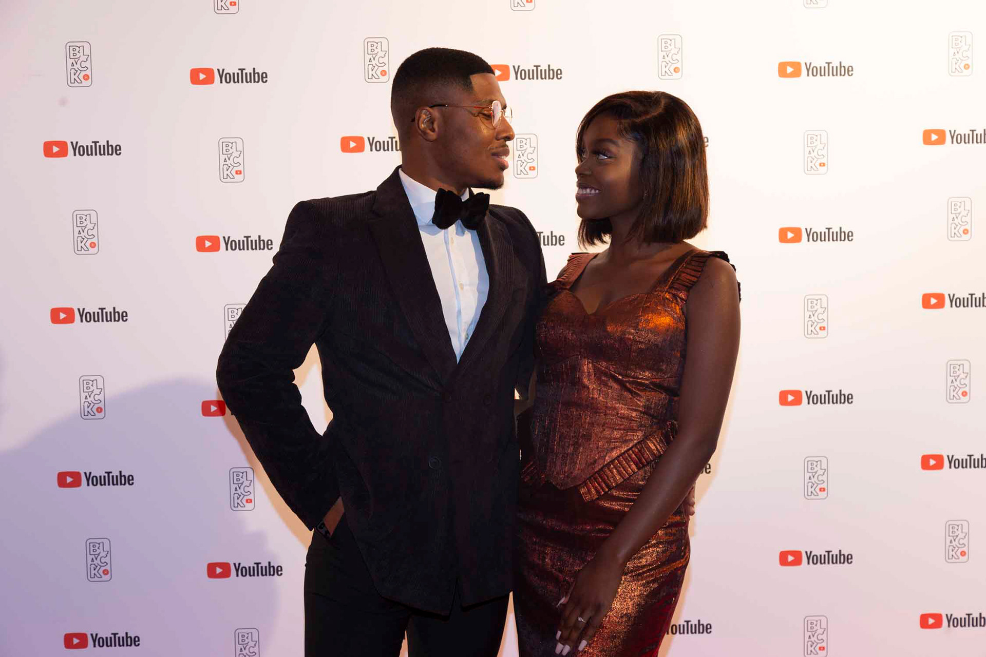 Youtube black creators event - Creator couple dressed up for the gala in tux and a dress