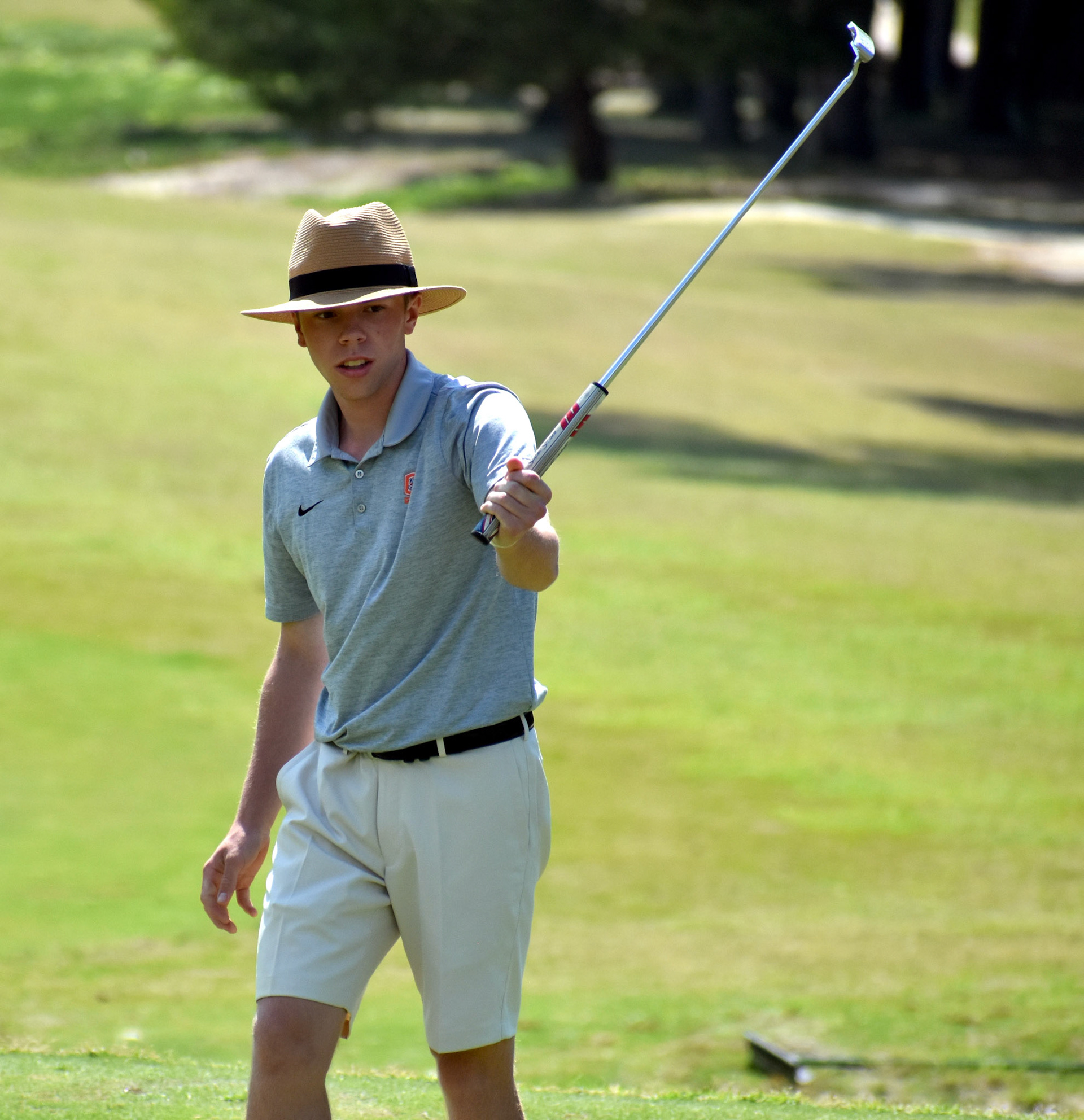 Preston Burton reacts to a missed birdie putt on 1.