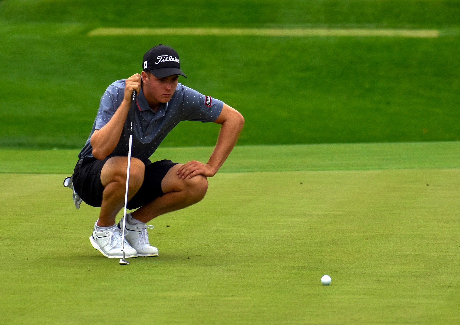 Chase Nevins eyes his putting line on 7