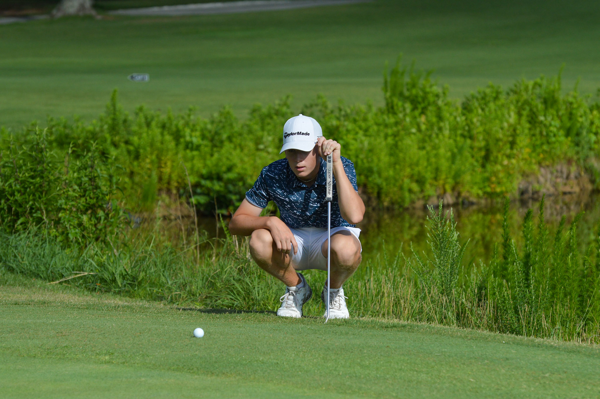 Logan Reilly on 8's green