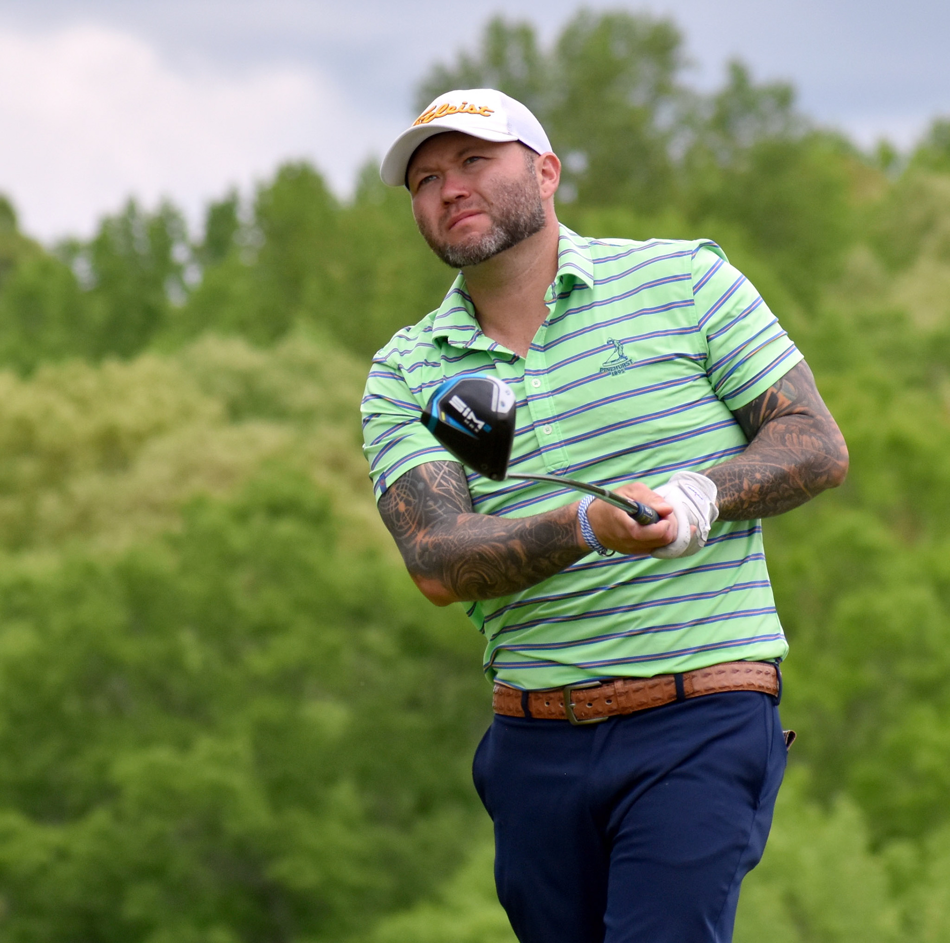 Charles Hammer tees off on 10