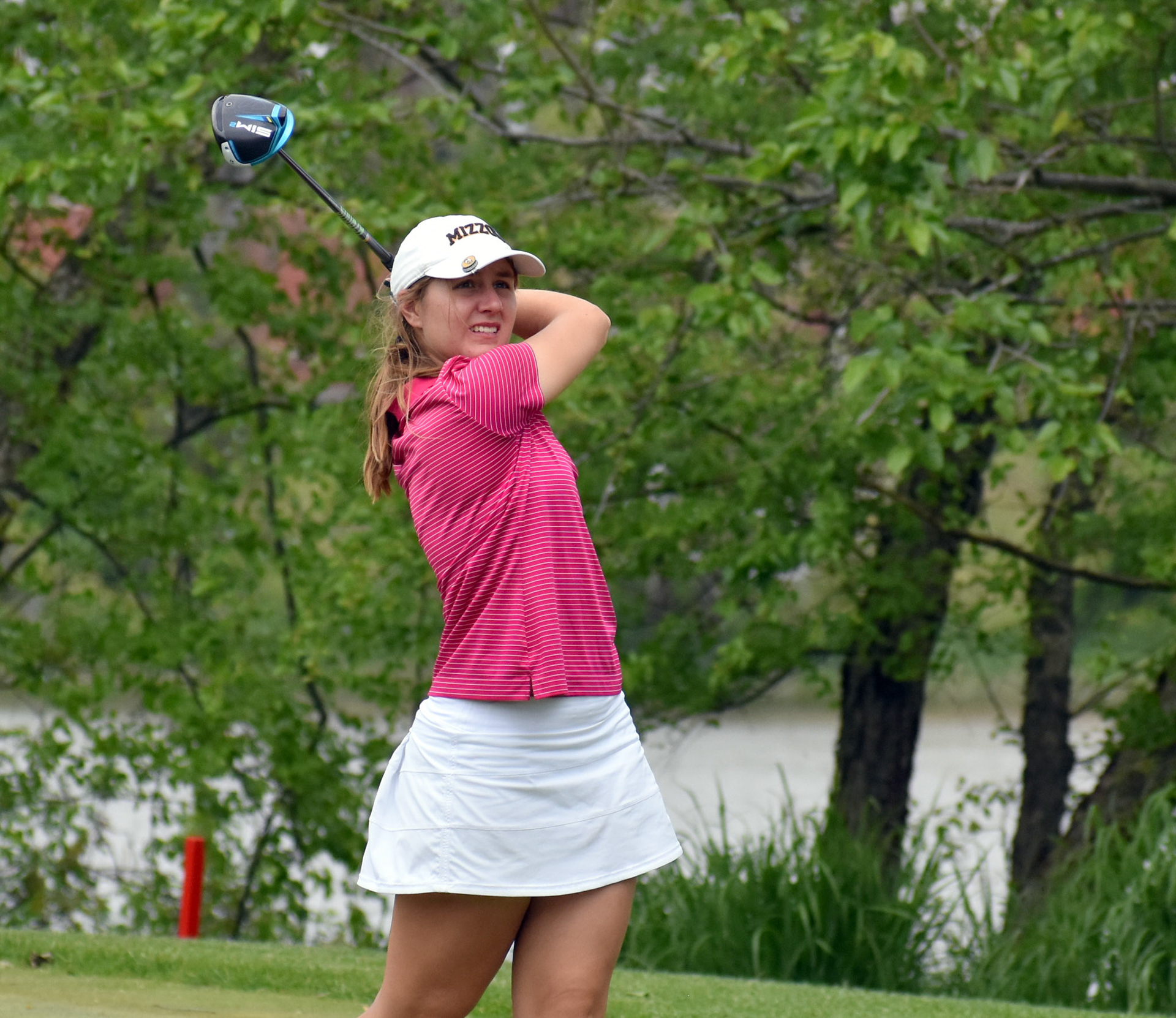 Melanie Walker tees off on 16.