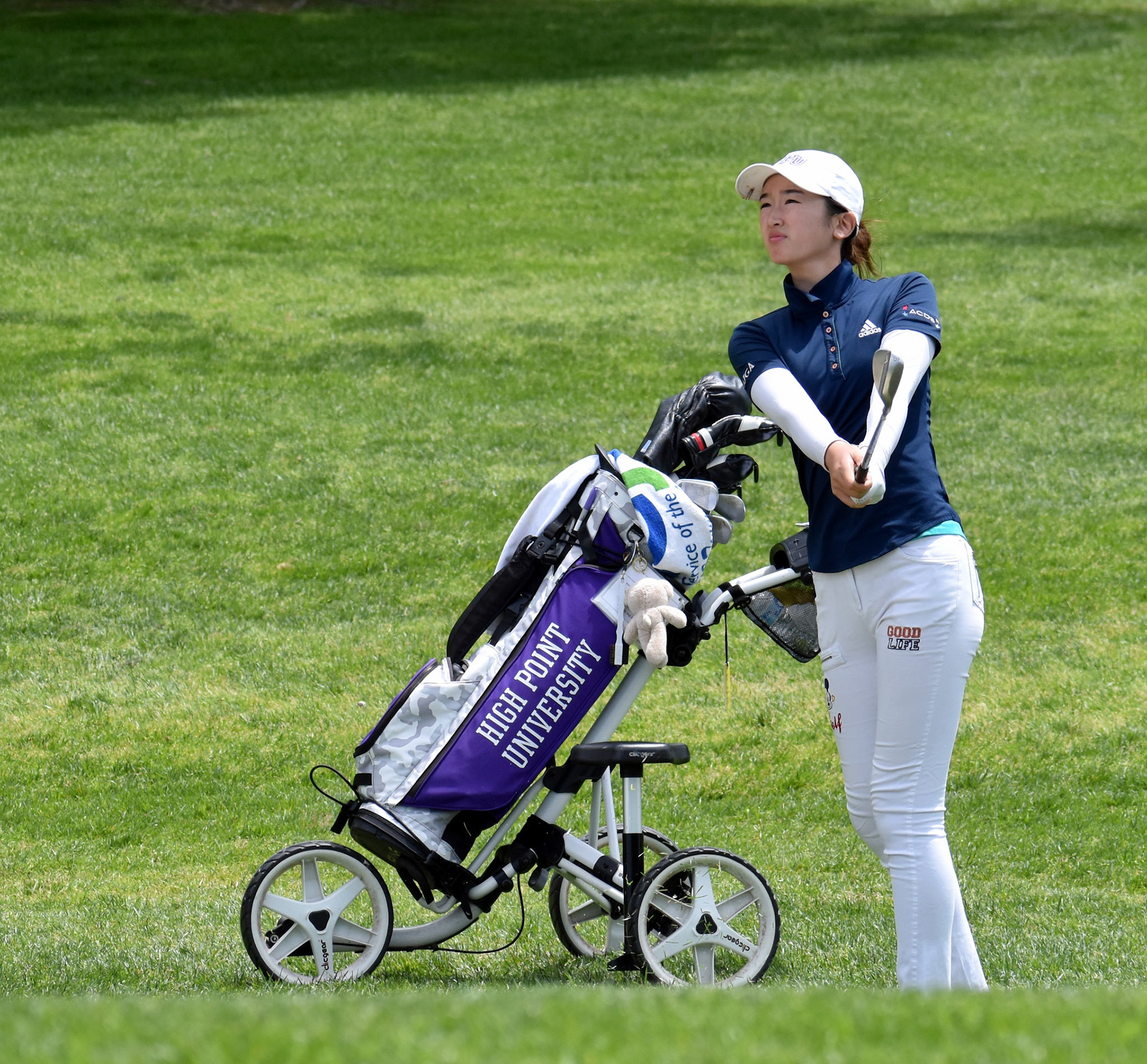 Danielle Suh watches her pitch on 3.
