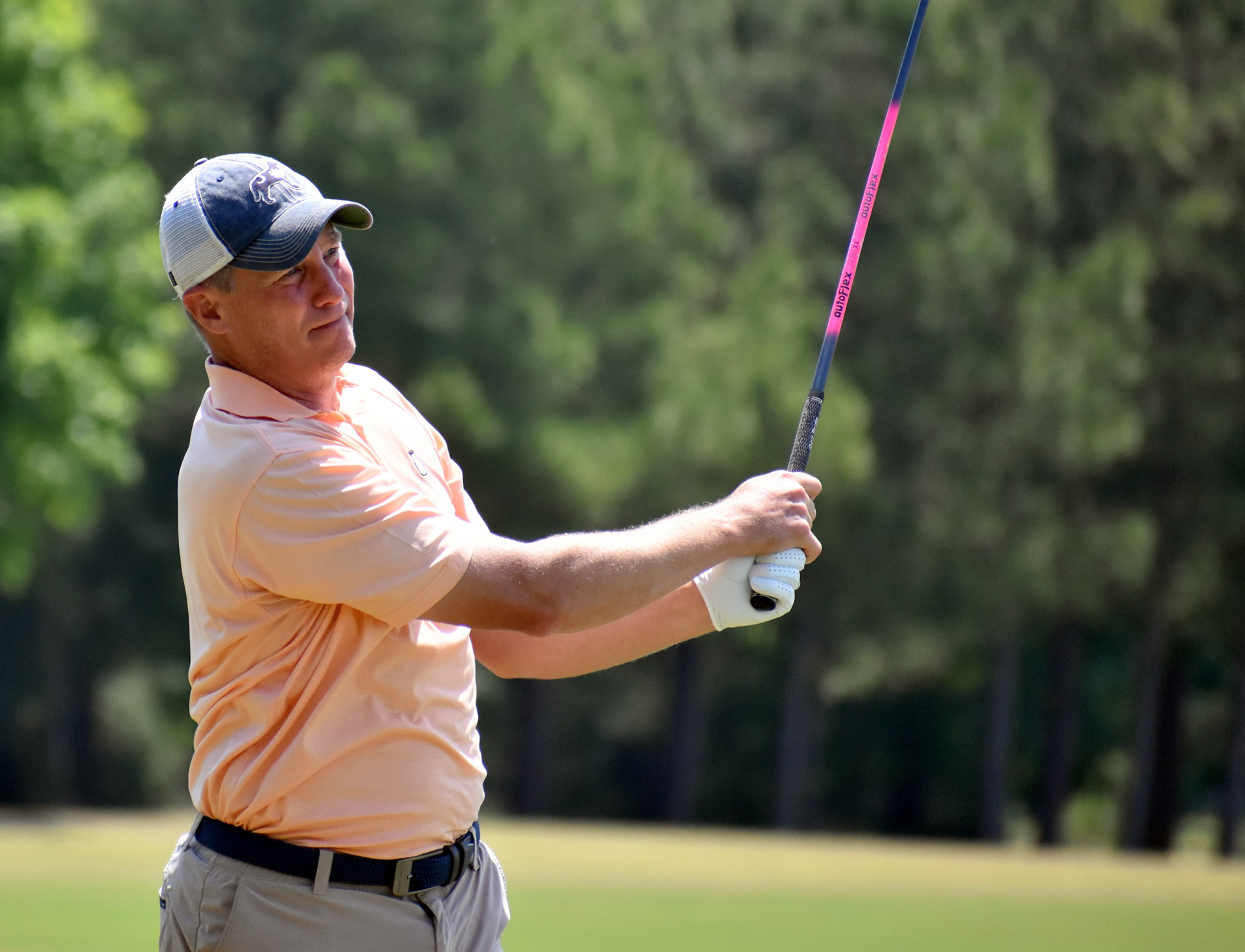 Chris Laughlin watches his drive on 3.