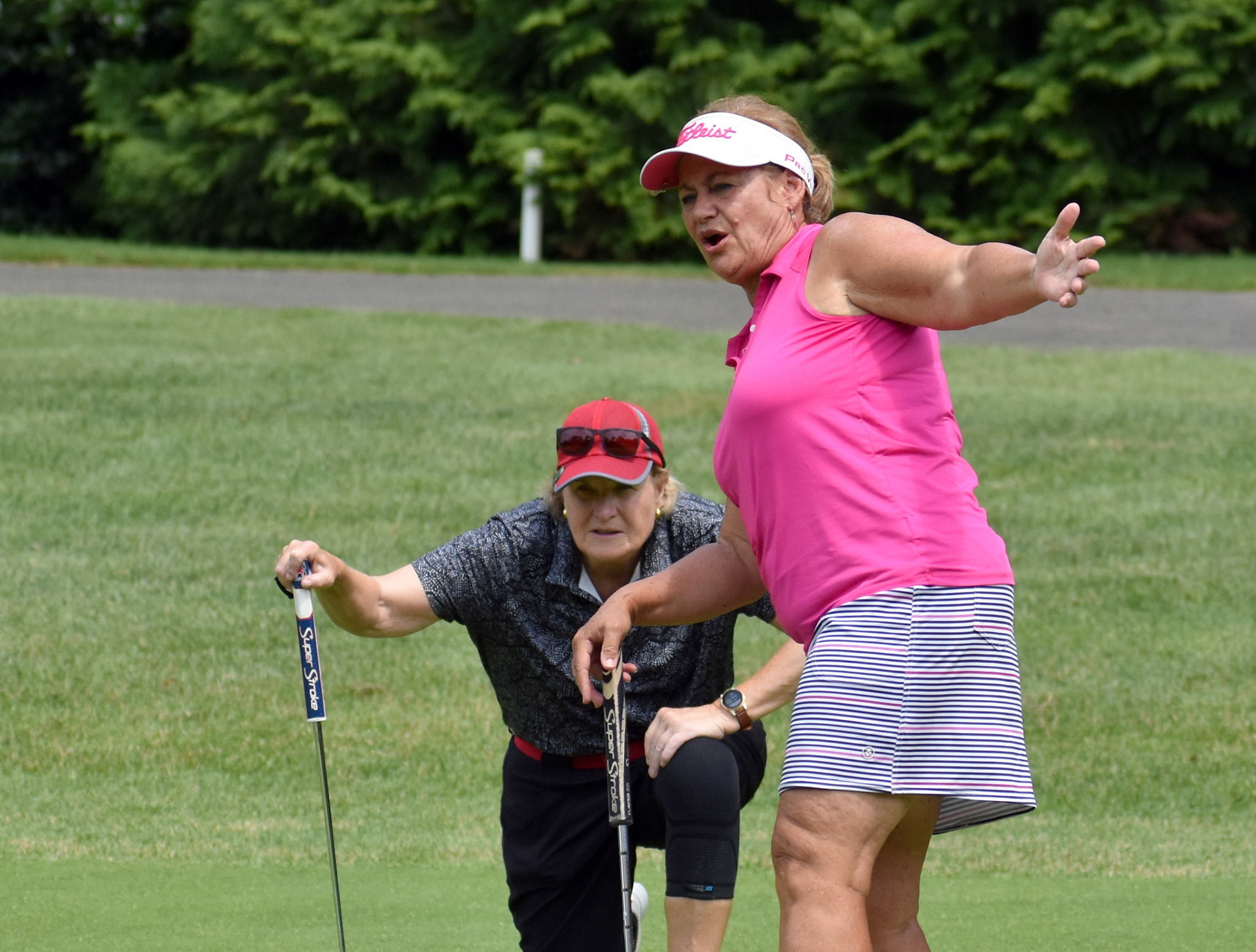 Gerry Stanley reacts to a missed putt on 4.