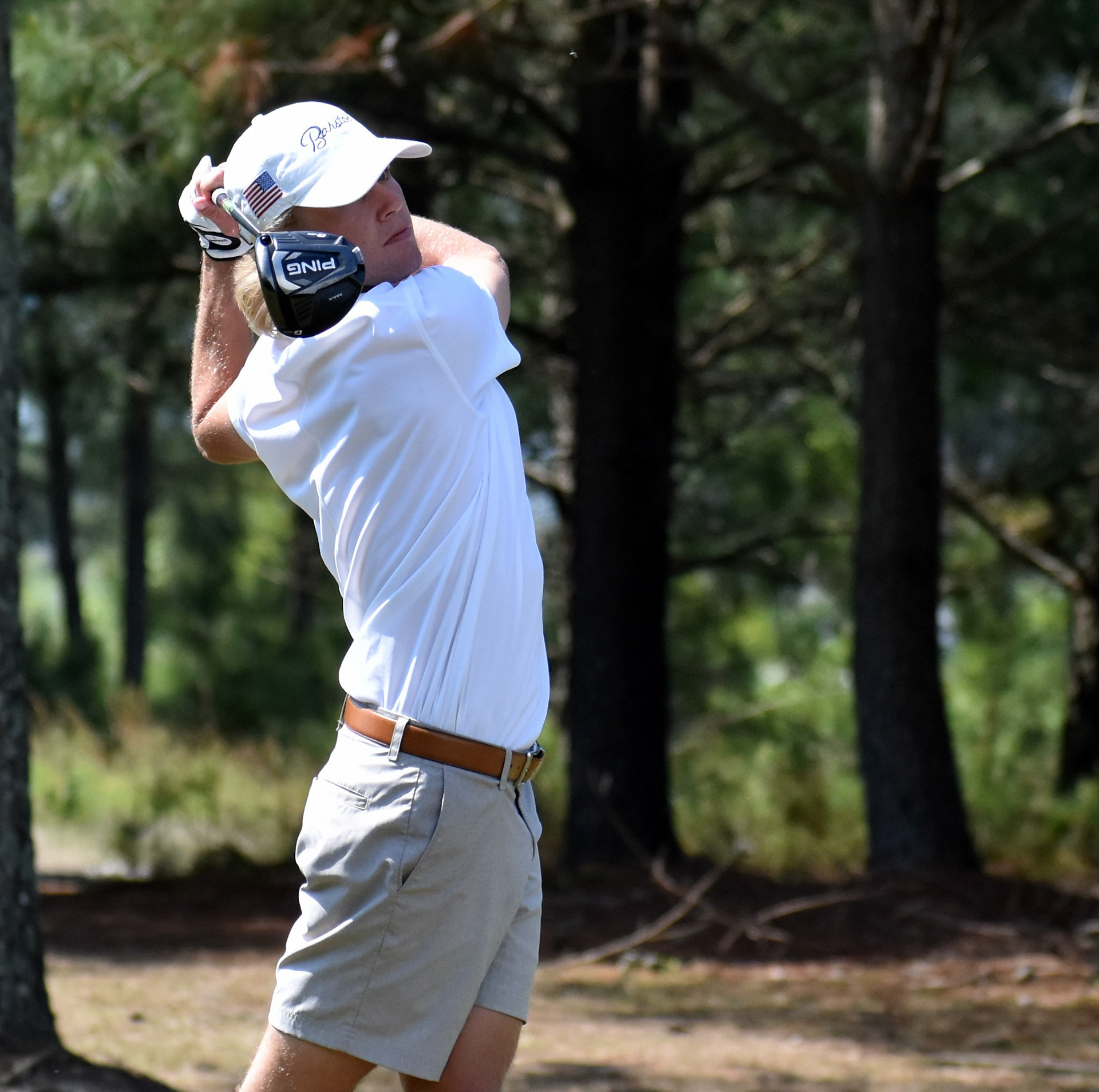 Channing Blevins watches his drive on 2.