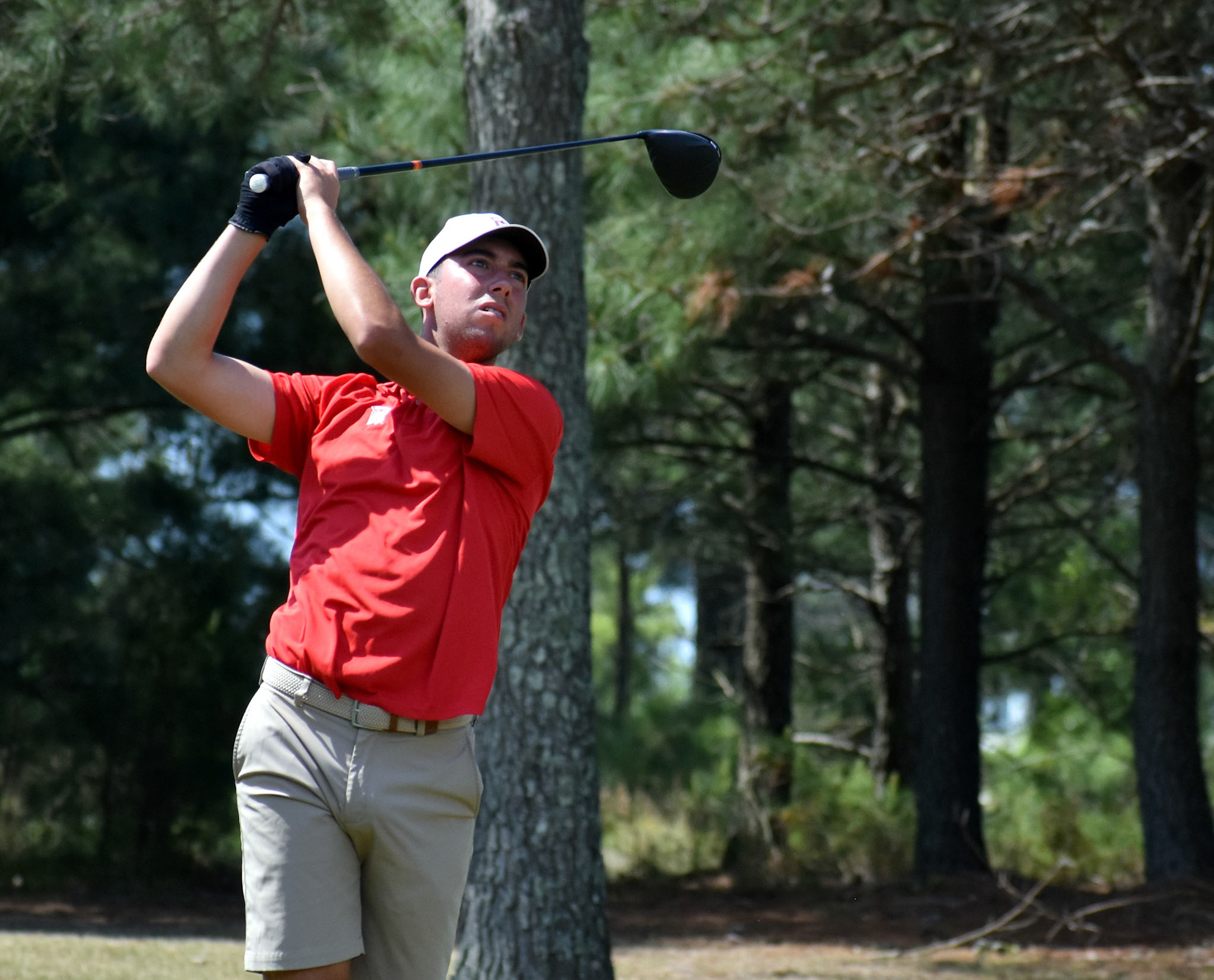 Bryce Corbett watches his drive on 2.