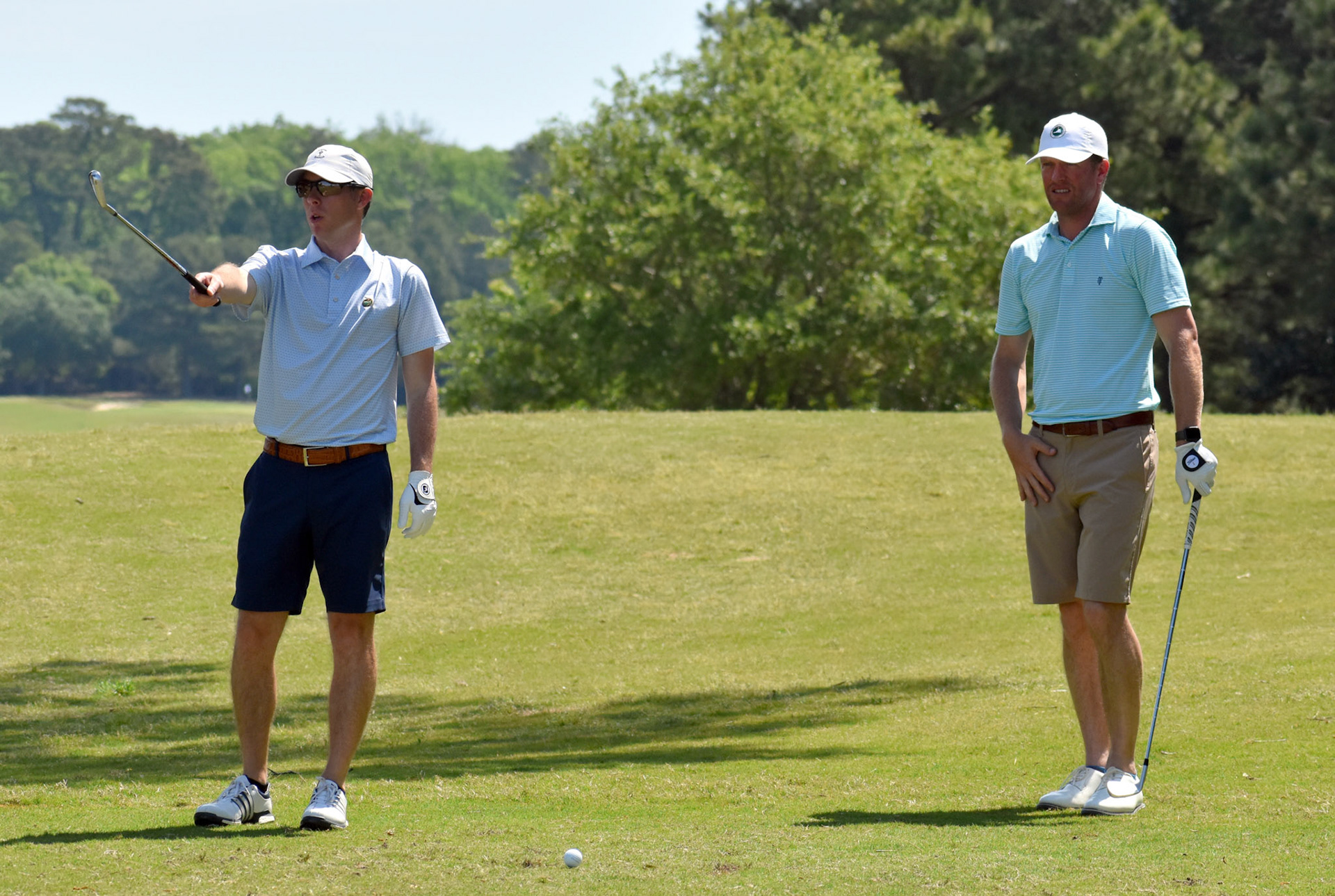 Jordan Utley gives partner Dustin Groves some guidance on 4 tee.