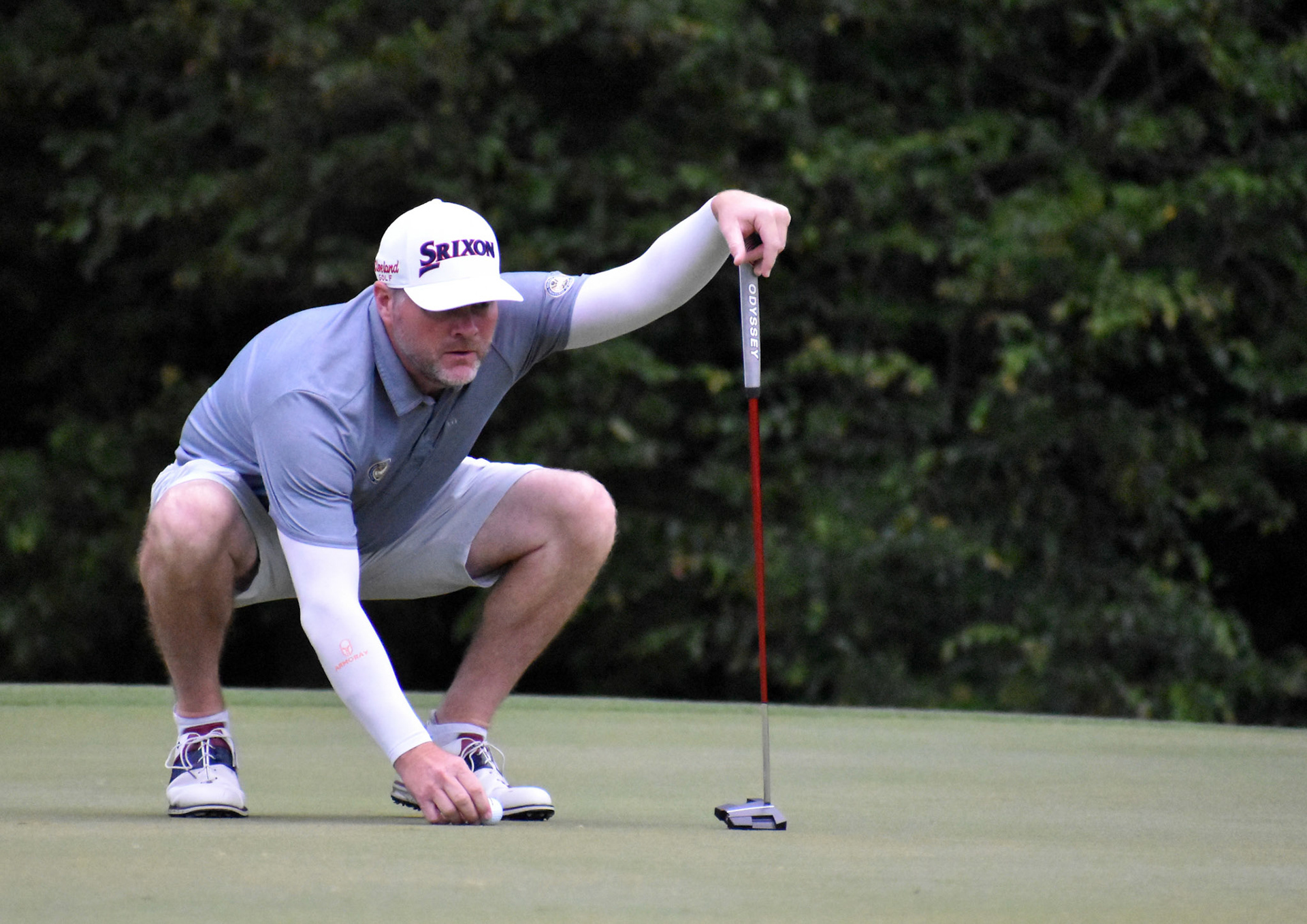 Martin Chandler lines up his putt on 12