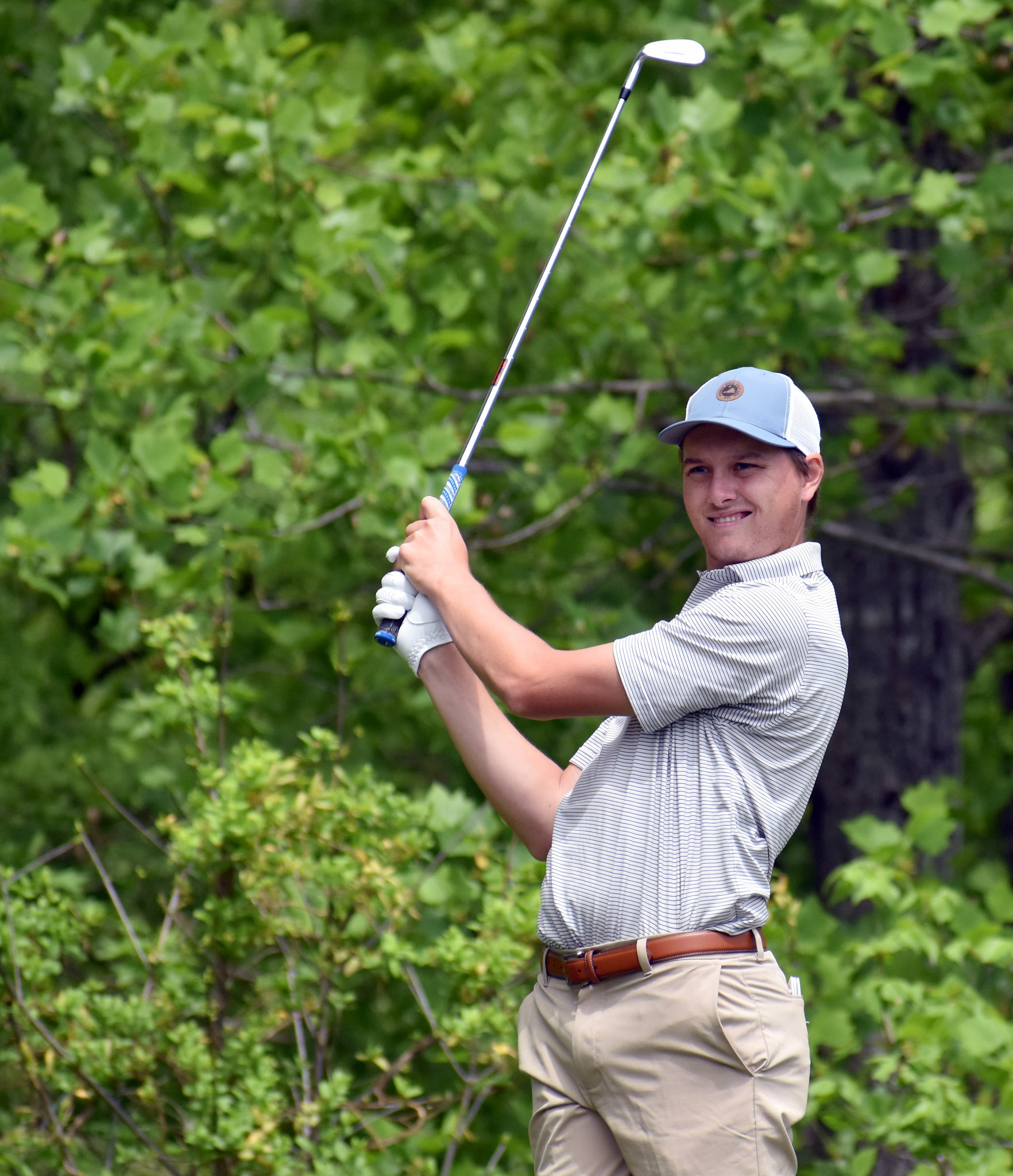 Alex Price eyes his tee shot on 11
