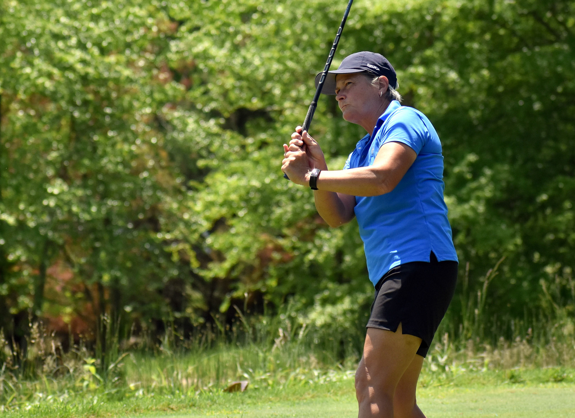 Amy Ellertson watches her drive on 10.