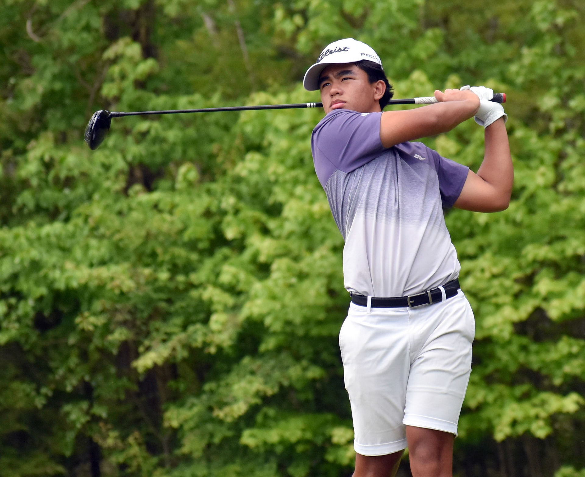 Xander Goboy tees off on 14