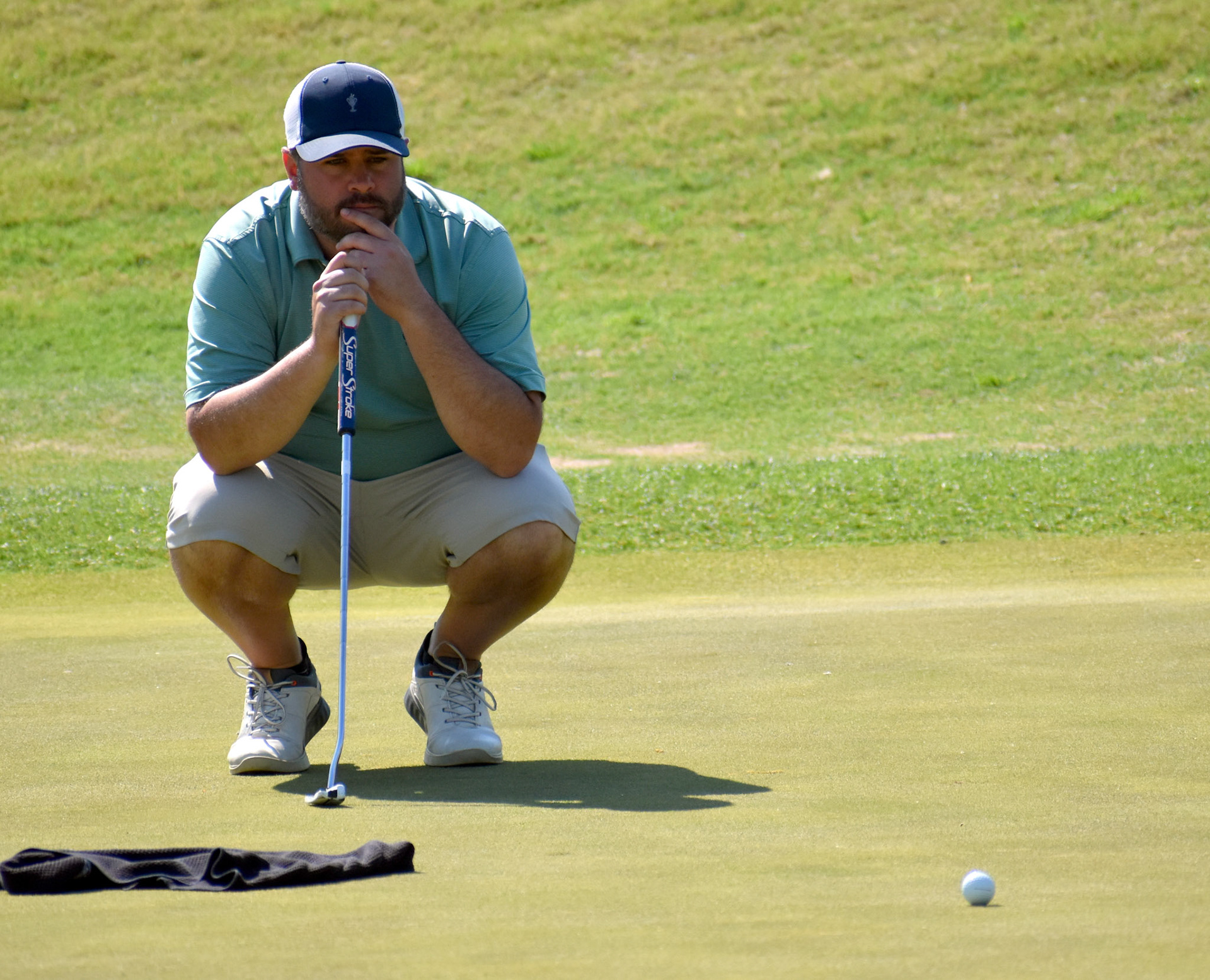 Hermitage's Ryan Bishop in deep thought on 14 green
