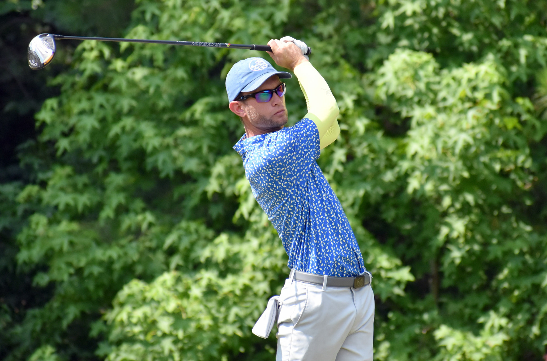 Trip Bose tees off on 16. Earlier in his round, he made a hole in one on the par-3 11th.