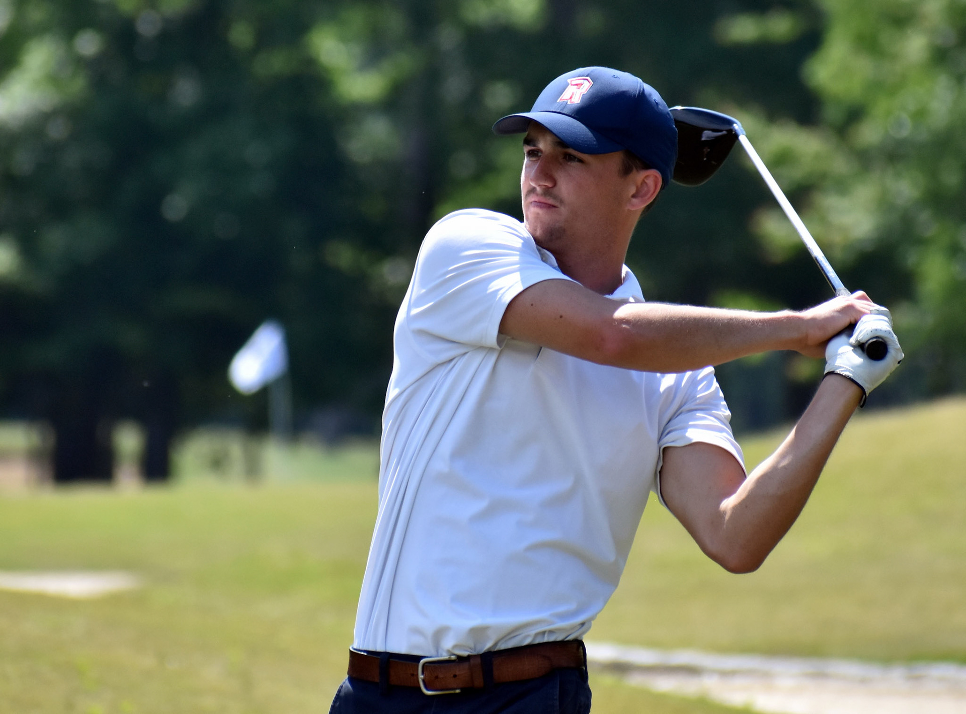 Nick Taliaferro watches his drive on 2.
