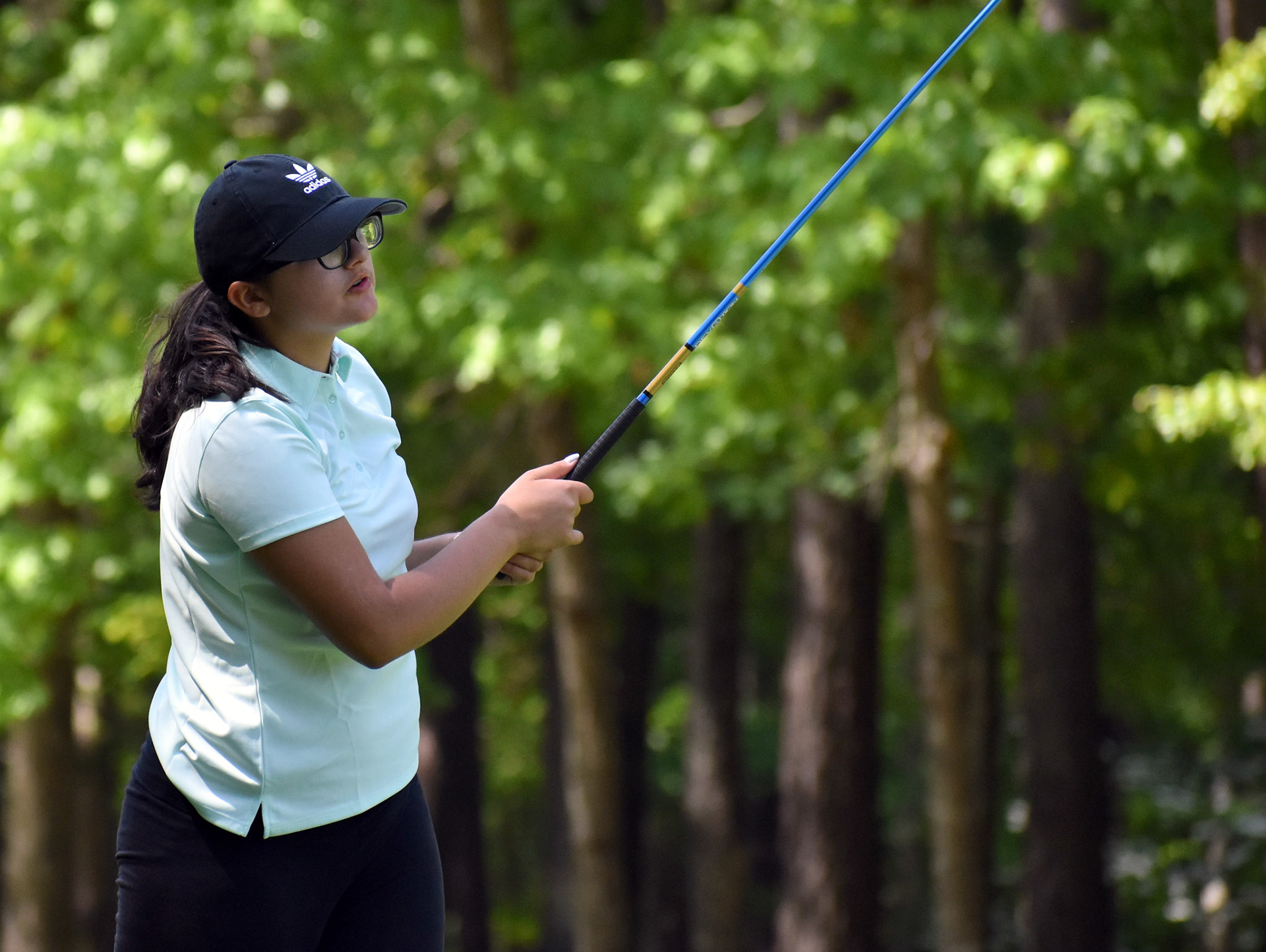 Ashnoor Kaur watches her drive on 11.