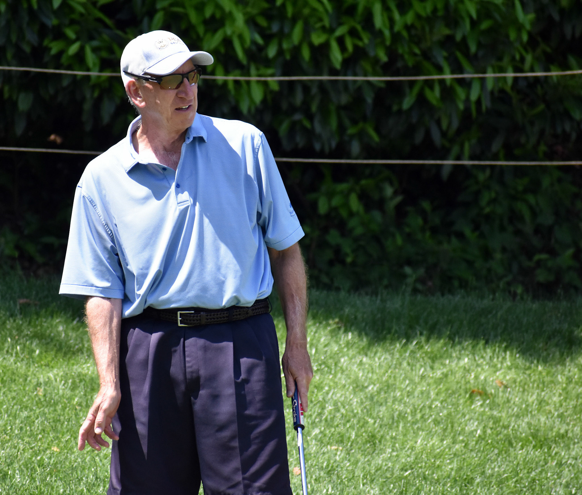 Bill Apple watches his putt from the fringe on 12.