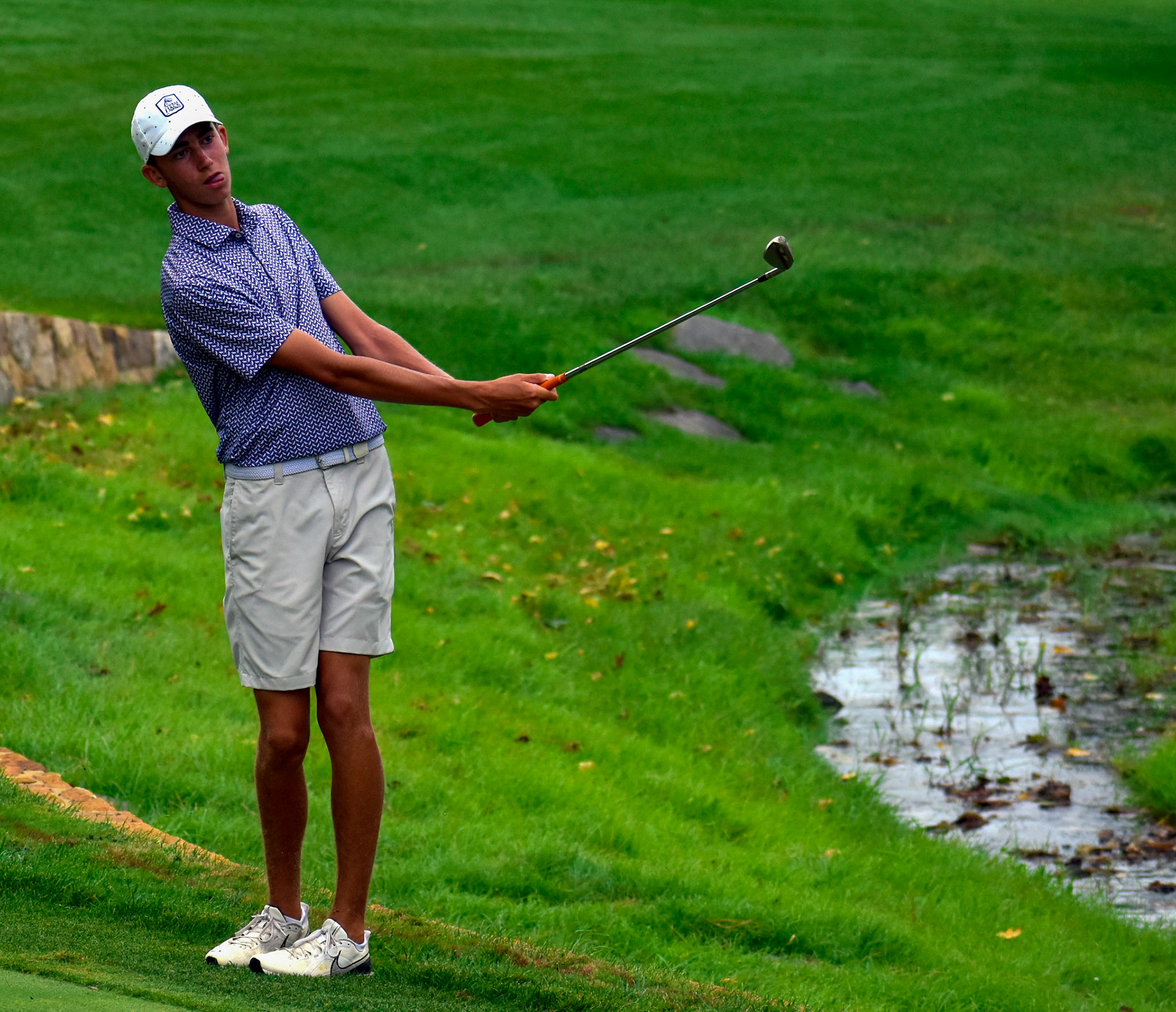 Tate Corbett hits his third after taking a penalty stroke for hitting into the penalty area on 3.
