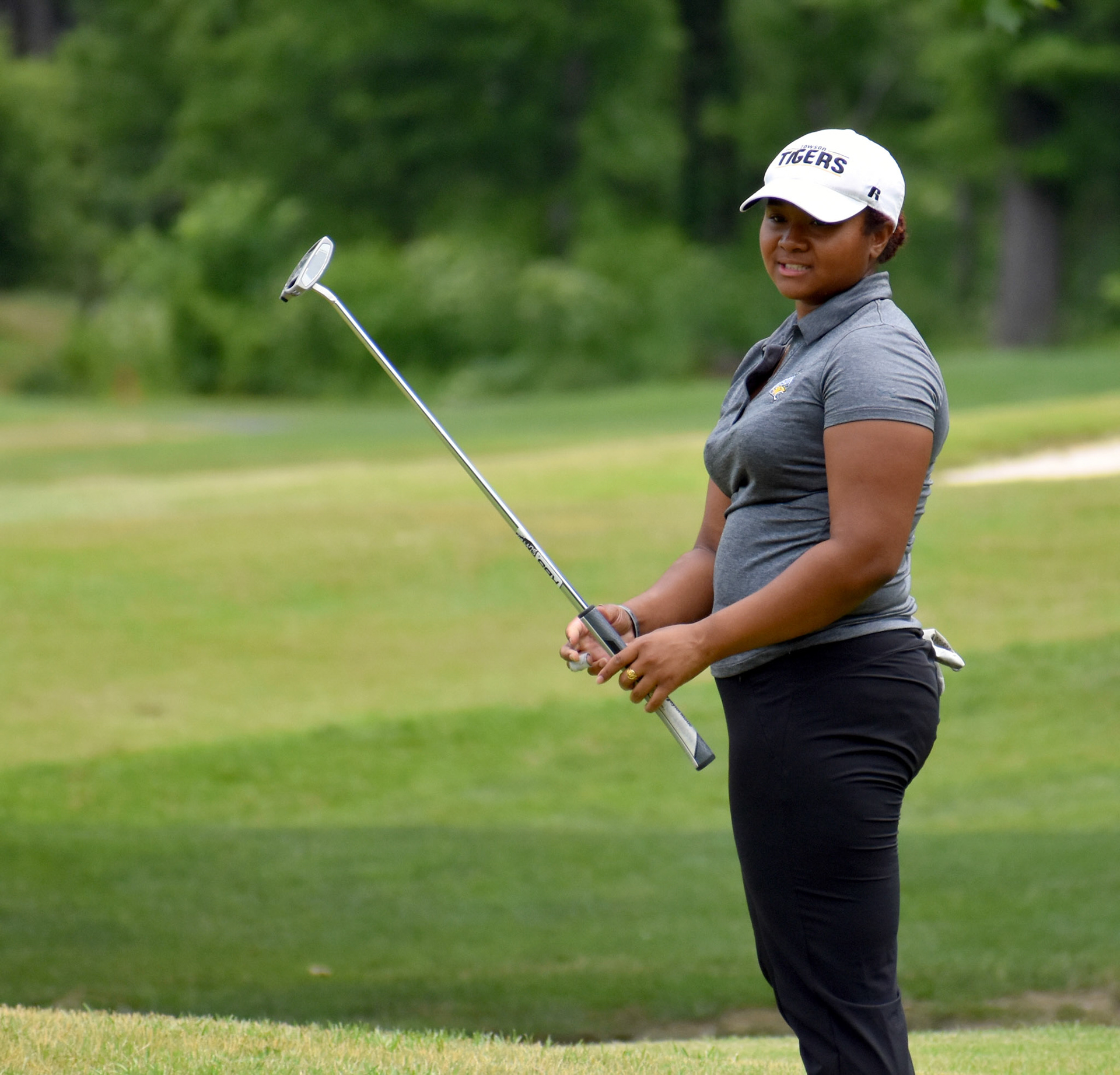 Rayab Lee reacts to a missed putt on 14.
