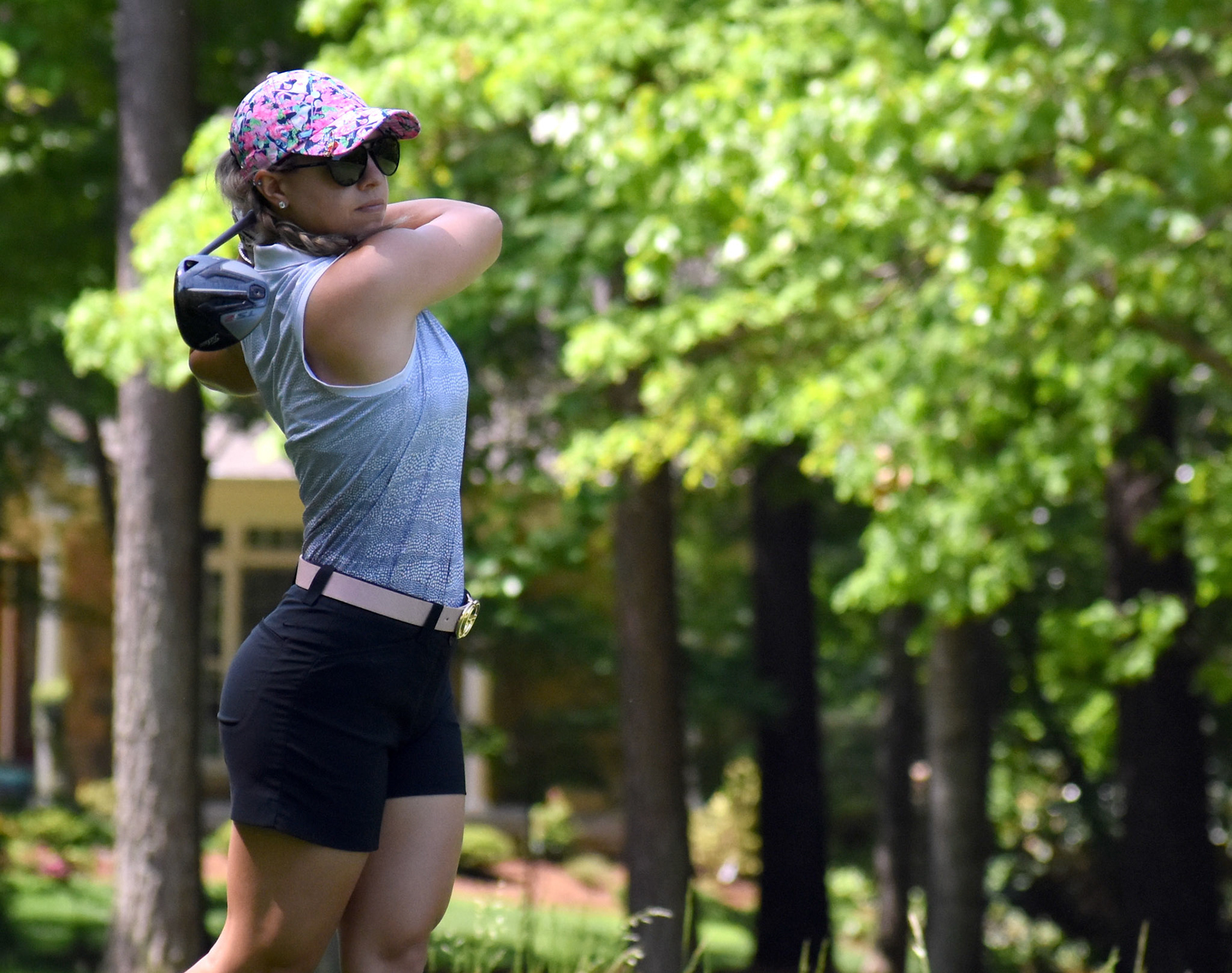 Alexandra Austin watches her drive on 11